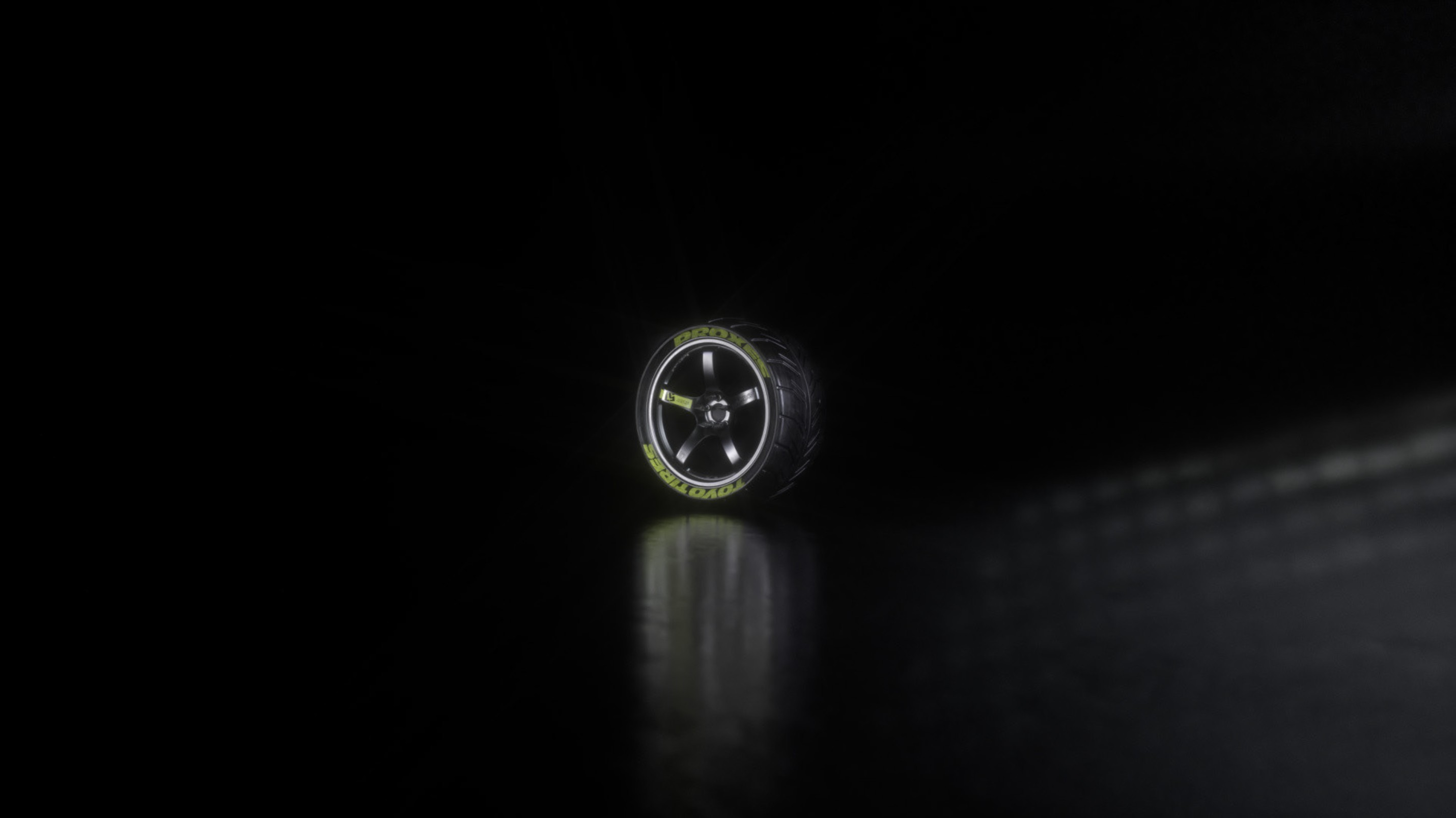 3D-Rendering der Felgenmitte mit sichtbarer Nabenkappe und metallischen Reflexionen auf dunklem Hintergrund