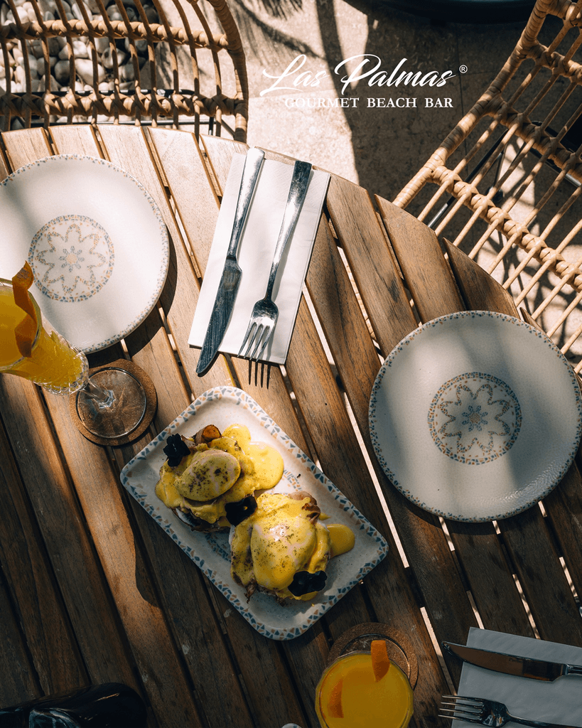 two glass of iced tea with some orange fruit around them