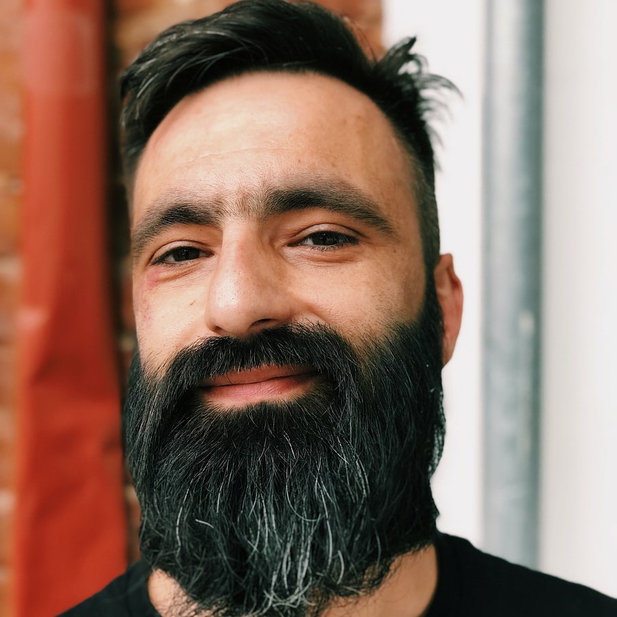 man wearing white V-neck shirt