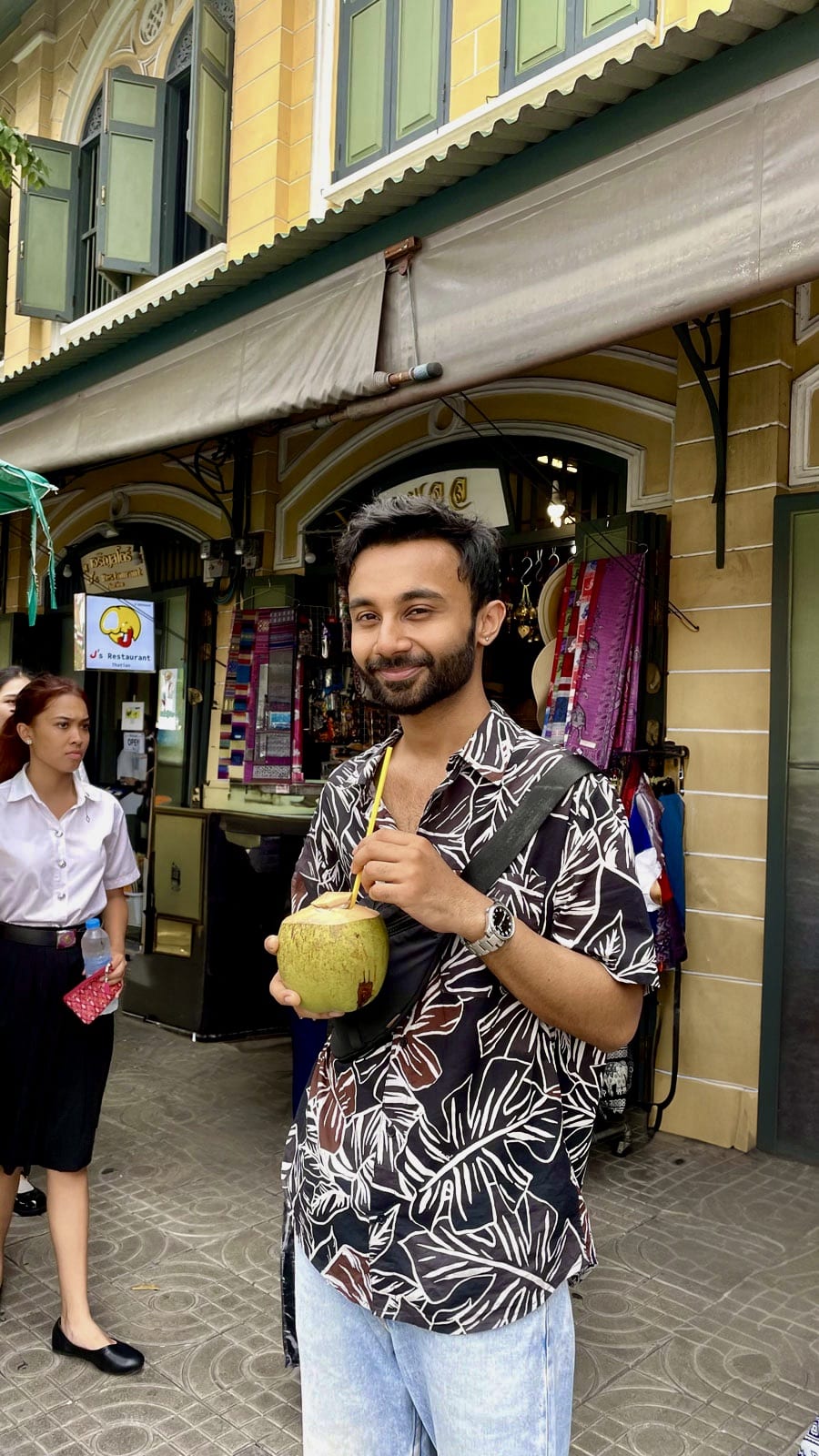 Harsha with a coconut