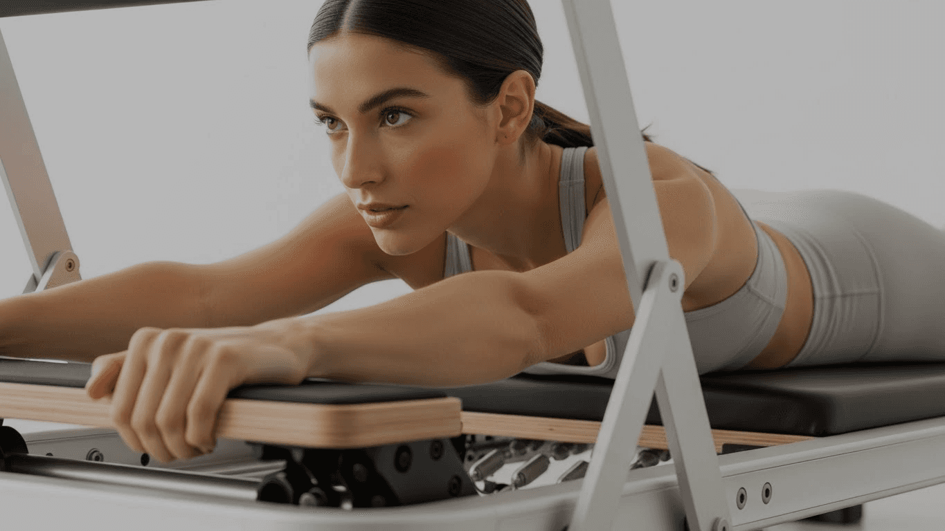 Rachel, personal trainer, looking to the side confidently in a fitness studio