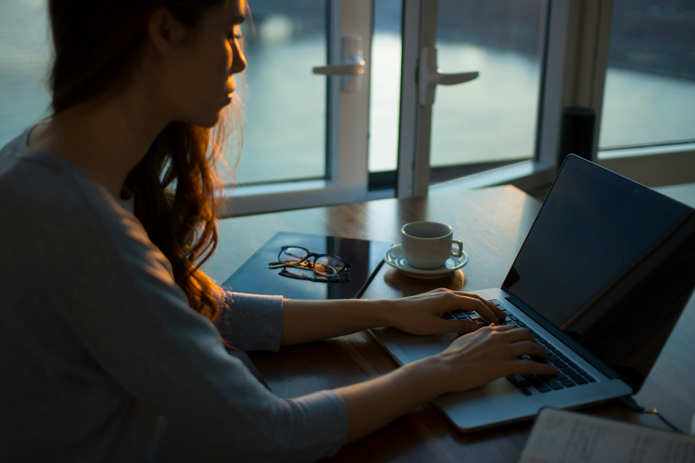 Lady using Laptop - PageFly