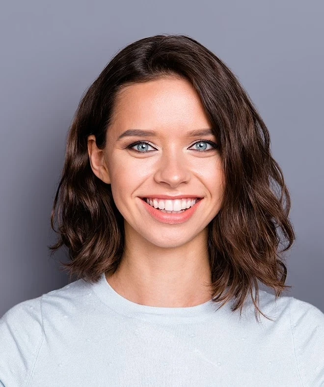Bright smile after applying Veneers treatment