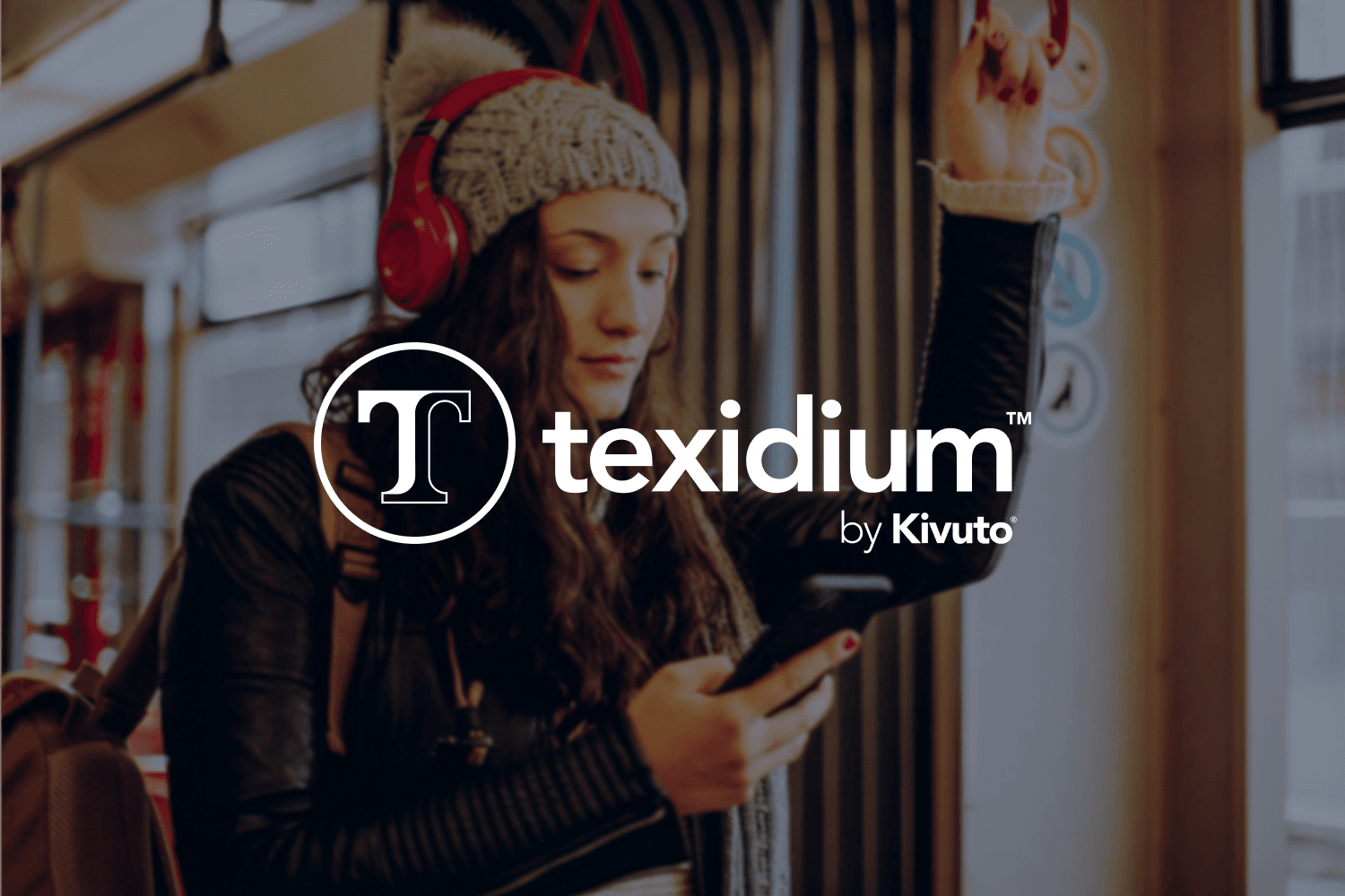 Texidium by Kivuto logo overlaid on a photo of a young woman wearing headphones and using a smartphone while riding public transit.
