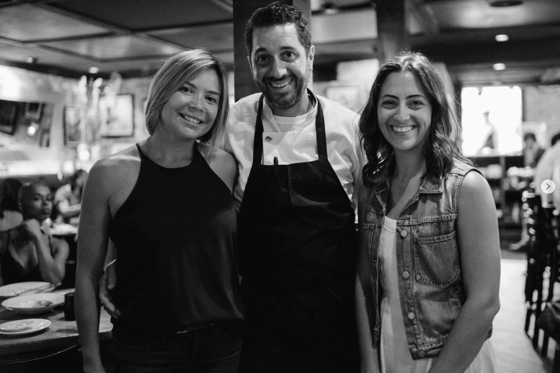 Macchialina founders Jen, Mike, and Jacqueline smiling together inside their restaurant