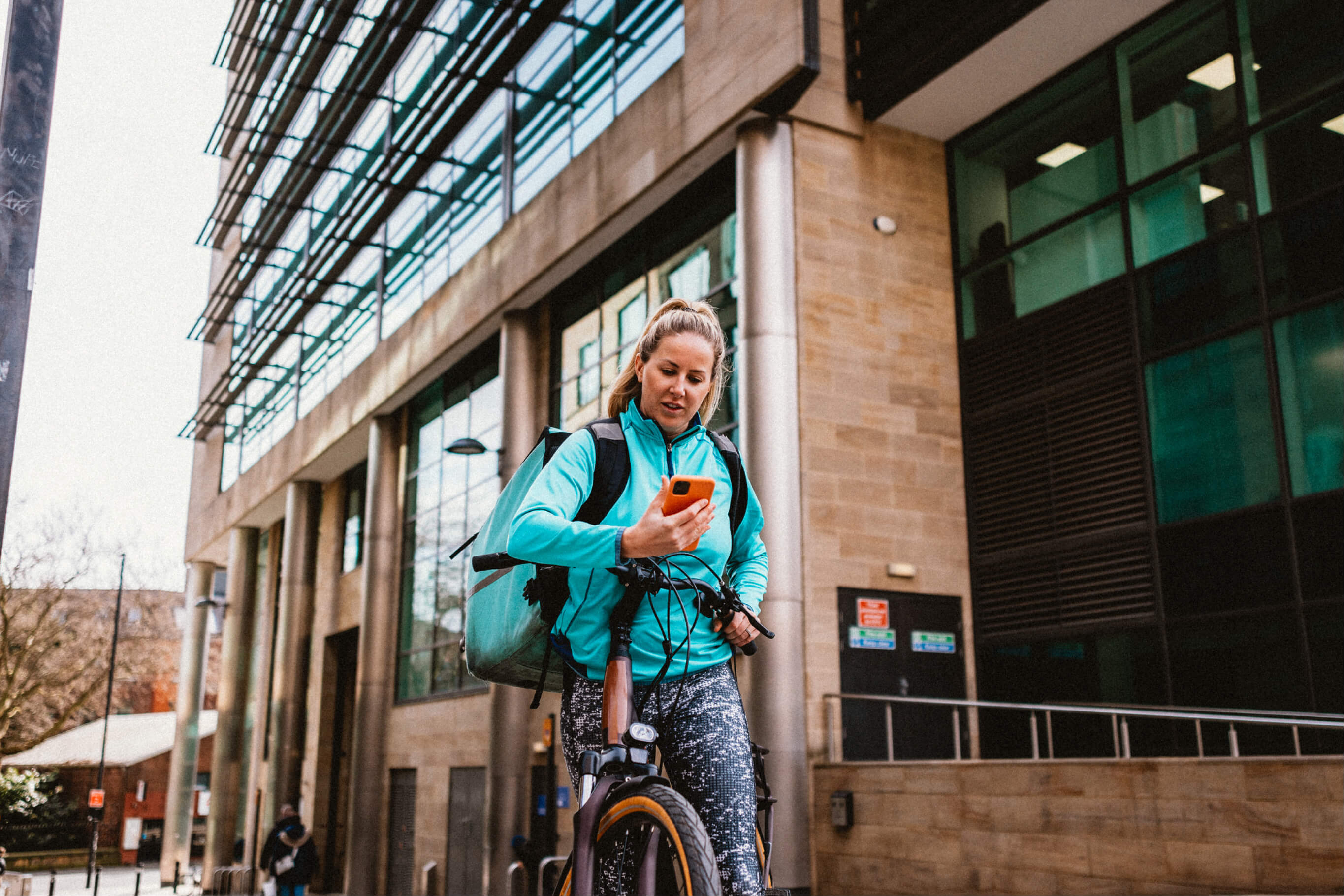 A worker checking their mobile phone