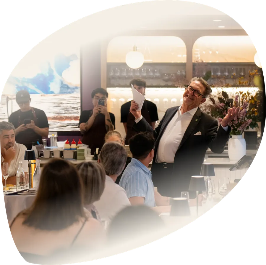 John Bligh speaking to guests at an Annata wine tasting evening