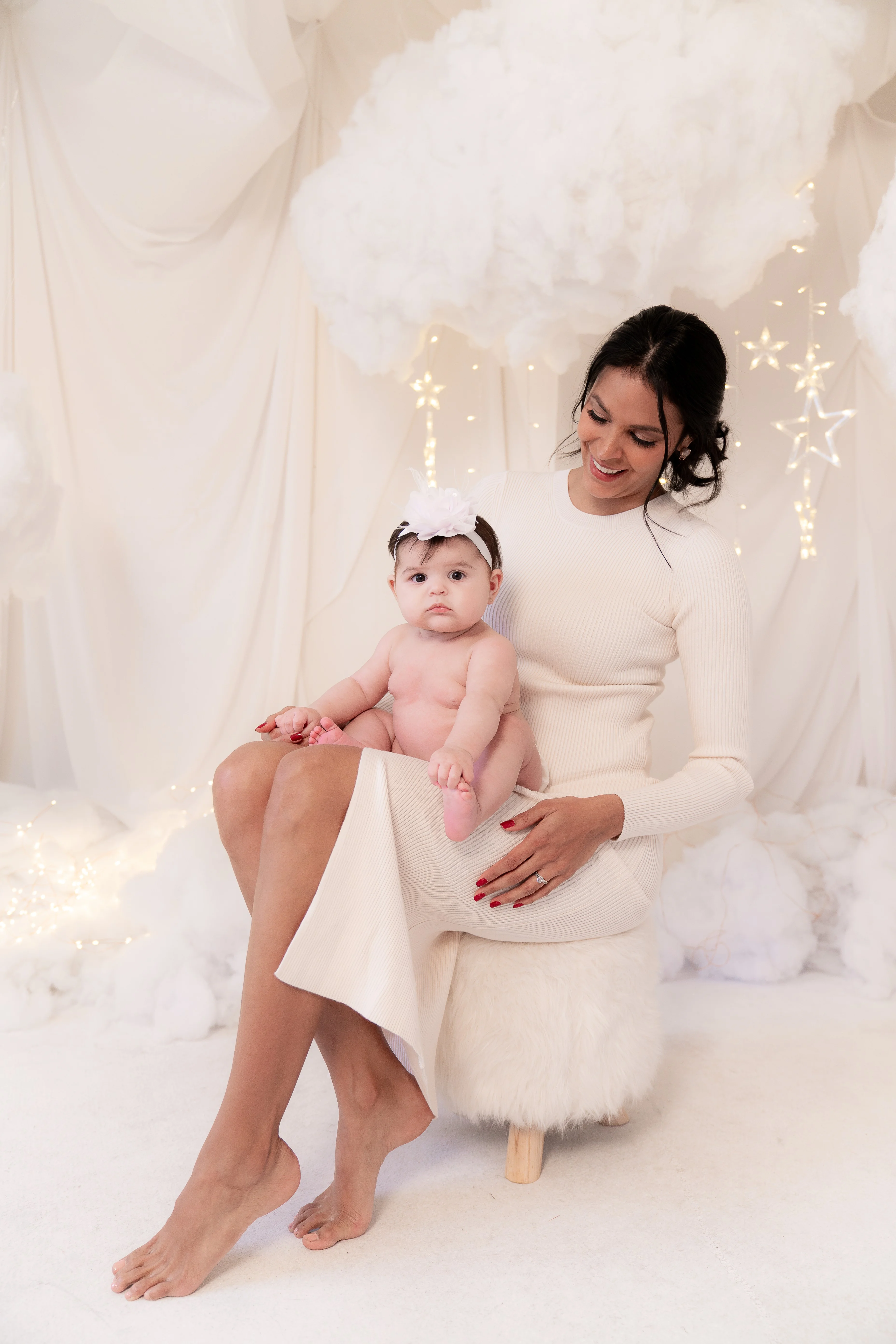 Keysi Saiyago with her baby, sharing a warm and joyful moment together.