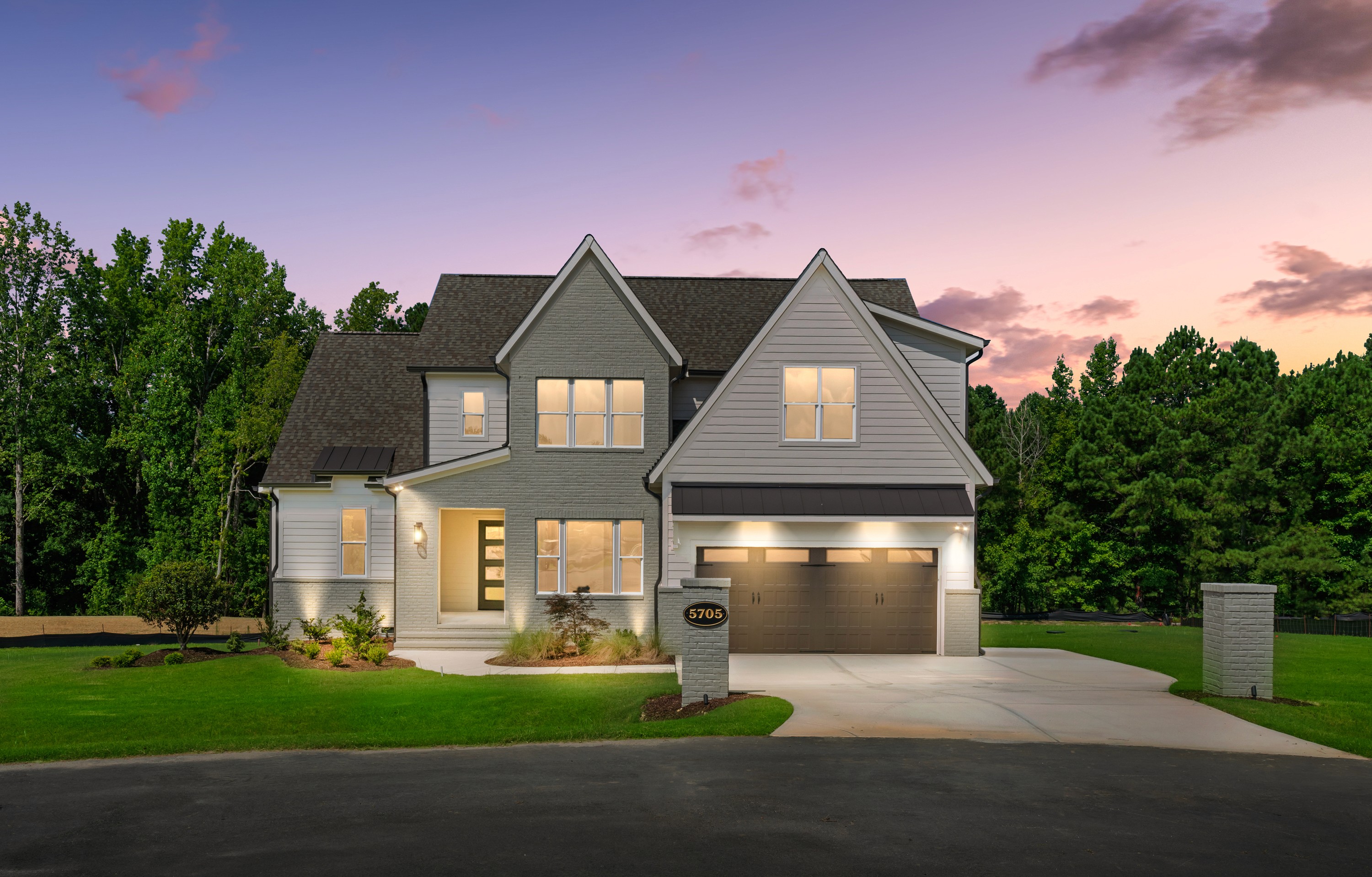 Luxury custom new construction home during twilight hour in Raleigh, NC.