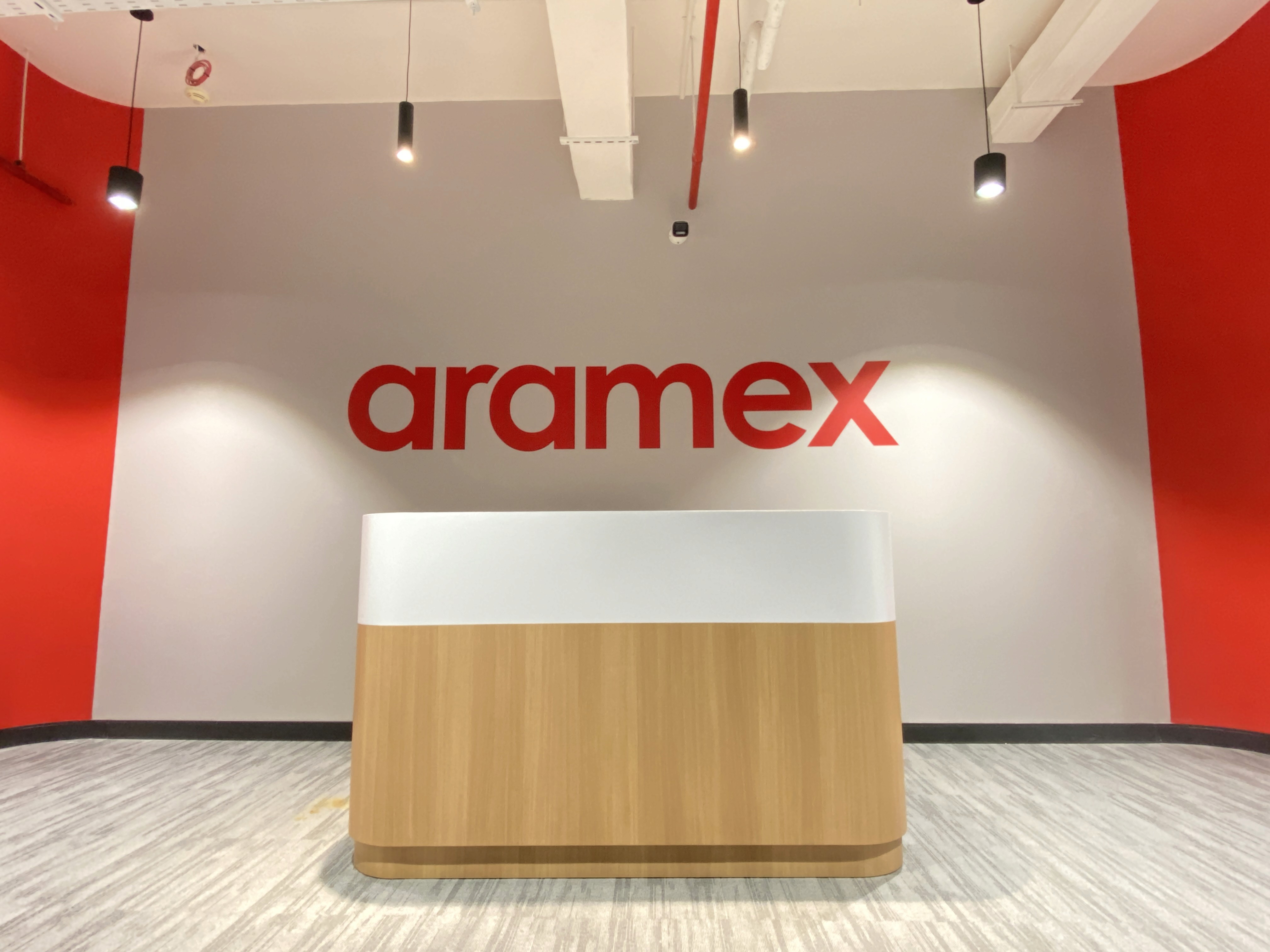 Aramex Head Office office fit-out project completed by Visualize Interior Decoration LLC in Abu Dhabi.