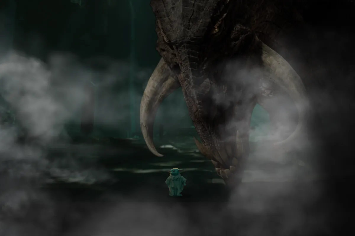 Grogu stands small yet fearless before the massive Mythosaur, its ancient form emerging from the mist. The creature’s piercing eyes lock onto him in the dark depths of Mandalore, hinting at a powerful connection between the young Force user and the legendary beast.