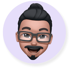 Smiling Memoji face -  a bearded man in glasses