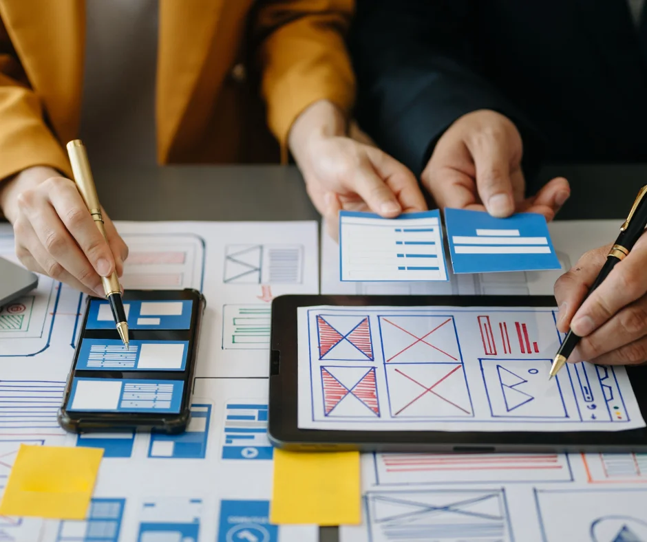 Two marketers working on content marketing in the office