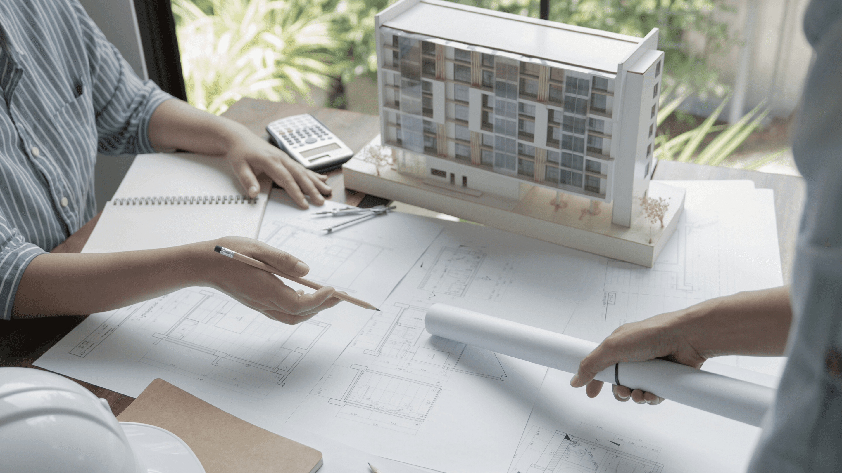 Architects model and plan drawings