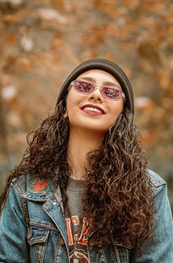 woman smiling and looking at the camera