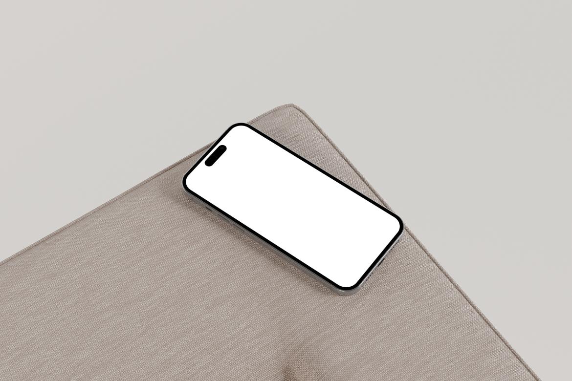 A sleek iPhone mockup resting on a beige fabric surface, showcasing its display with a high-contrast, modern design. The composition emphasizes a minimalist, professional aesthetic.