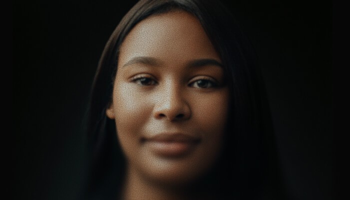 A woman against a dark background