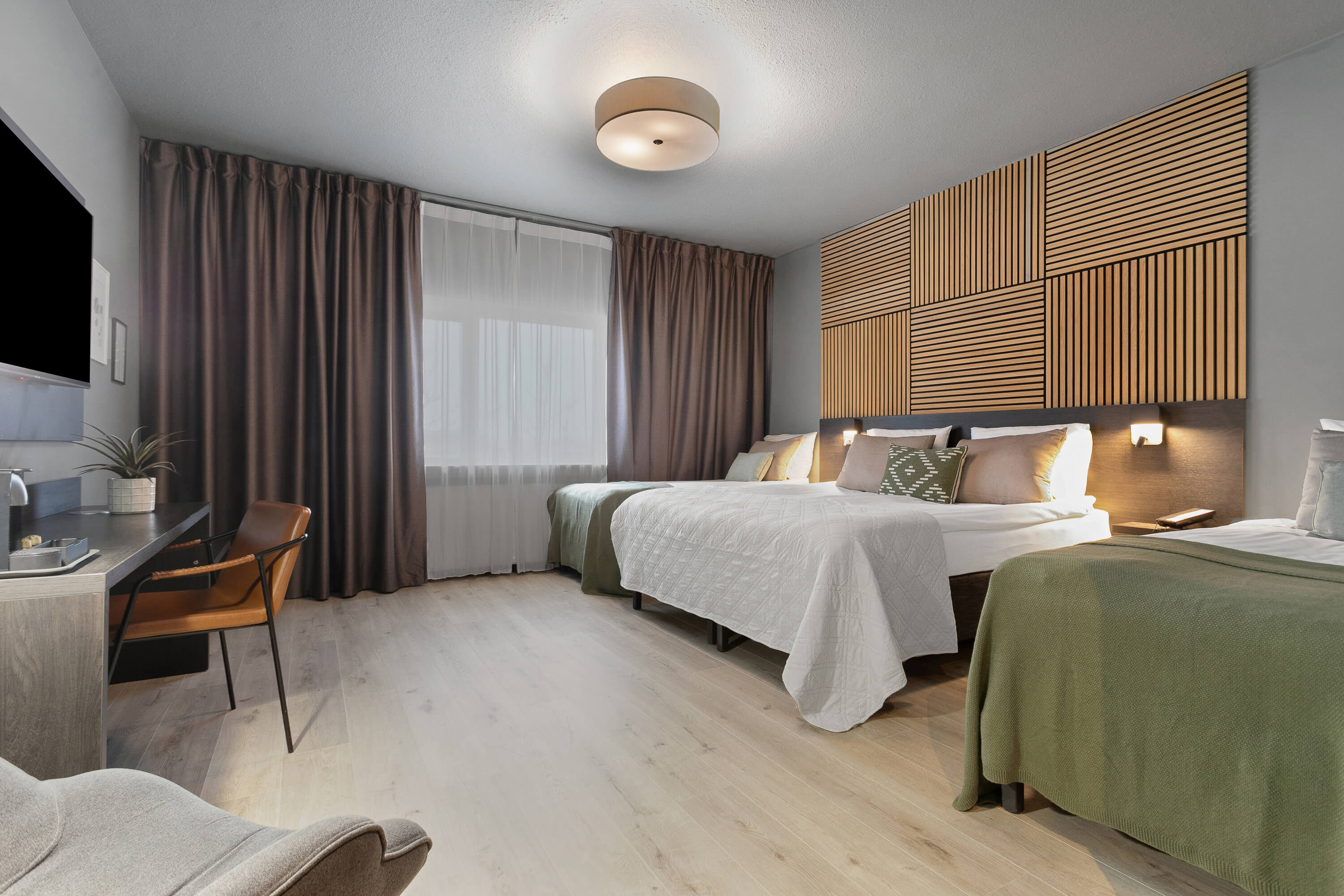 Fjögurra manna herbergi Konvin Hotel