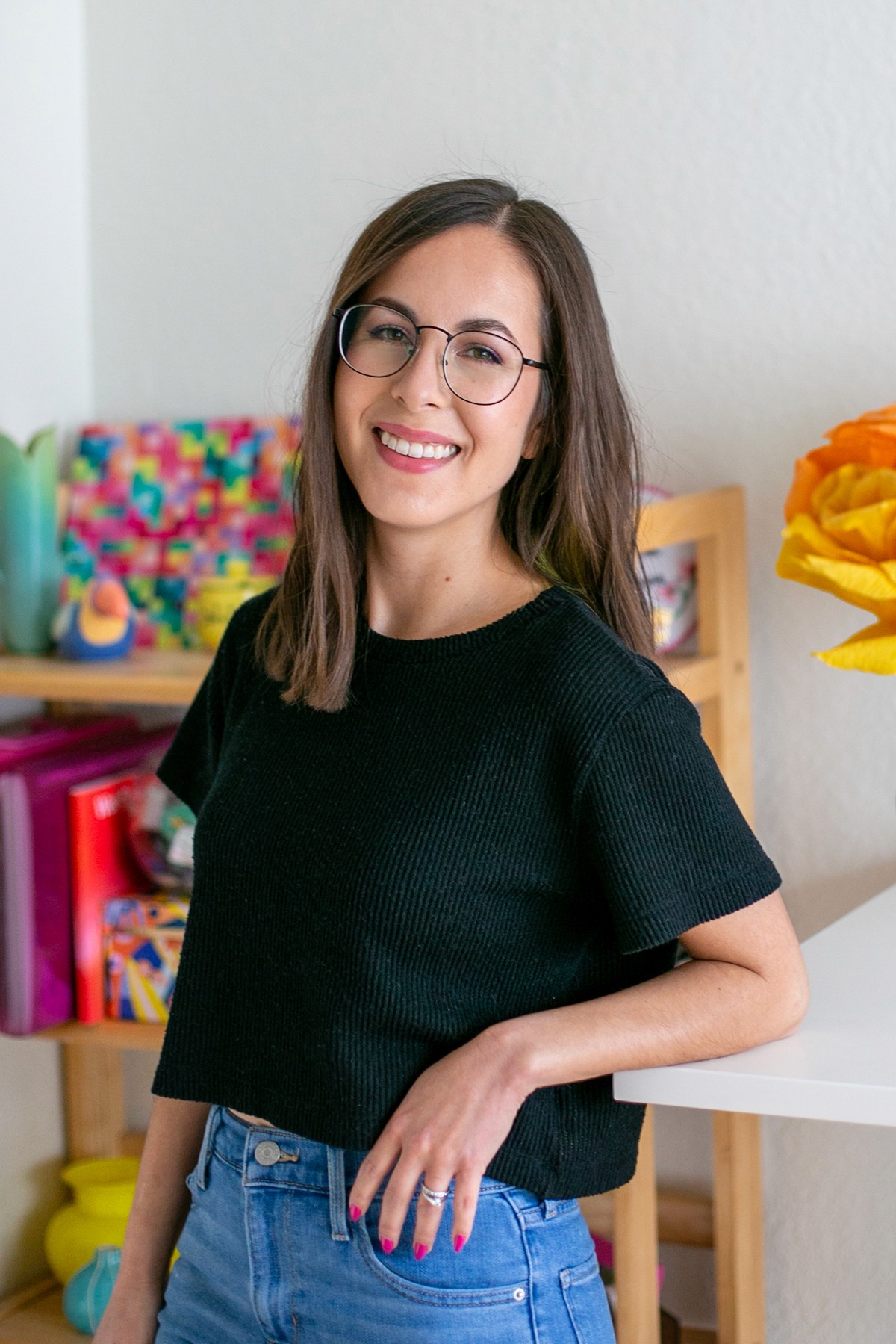 A photo of Christine Maggi in her home office.