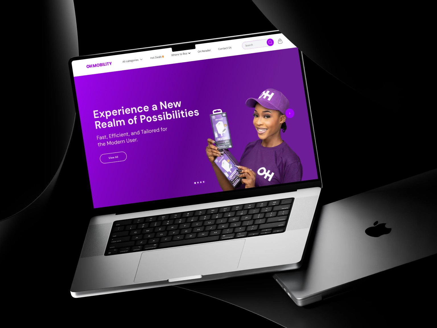 A mockup for a Macbook place on a table for a hair salon website