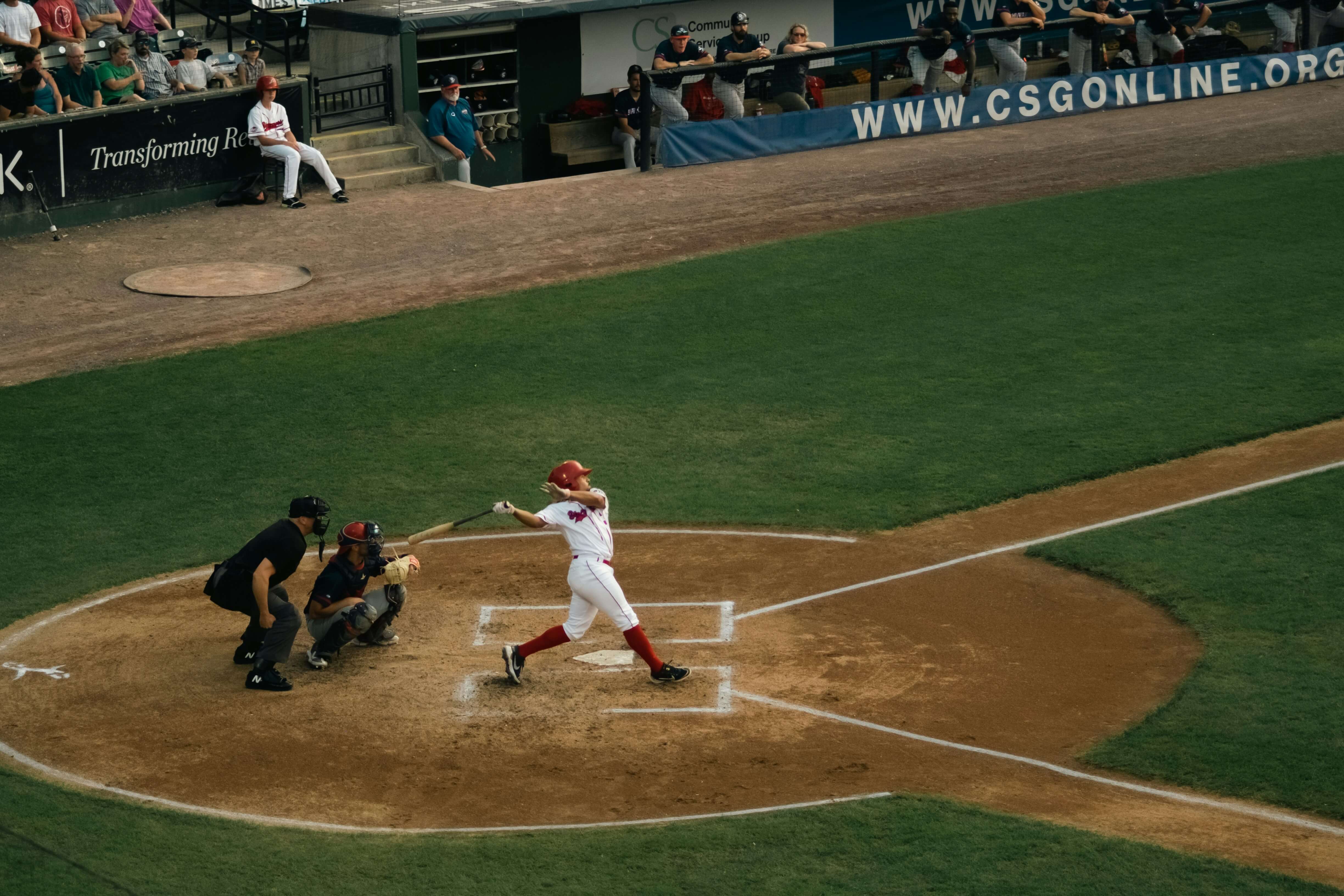 Person playing baseball in a stadium