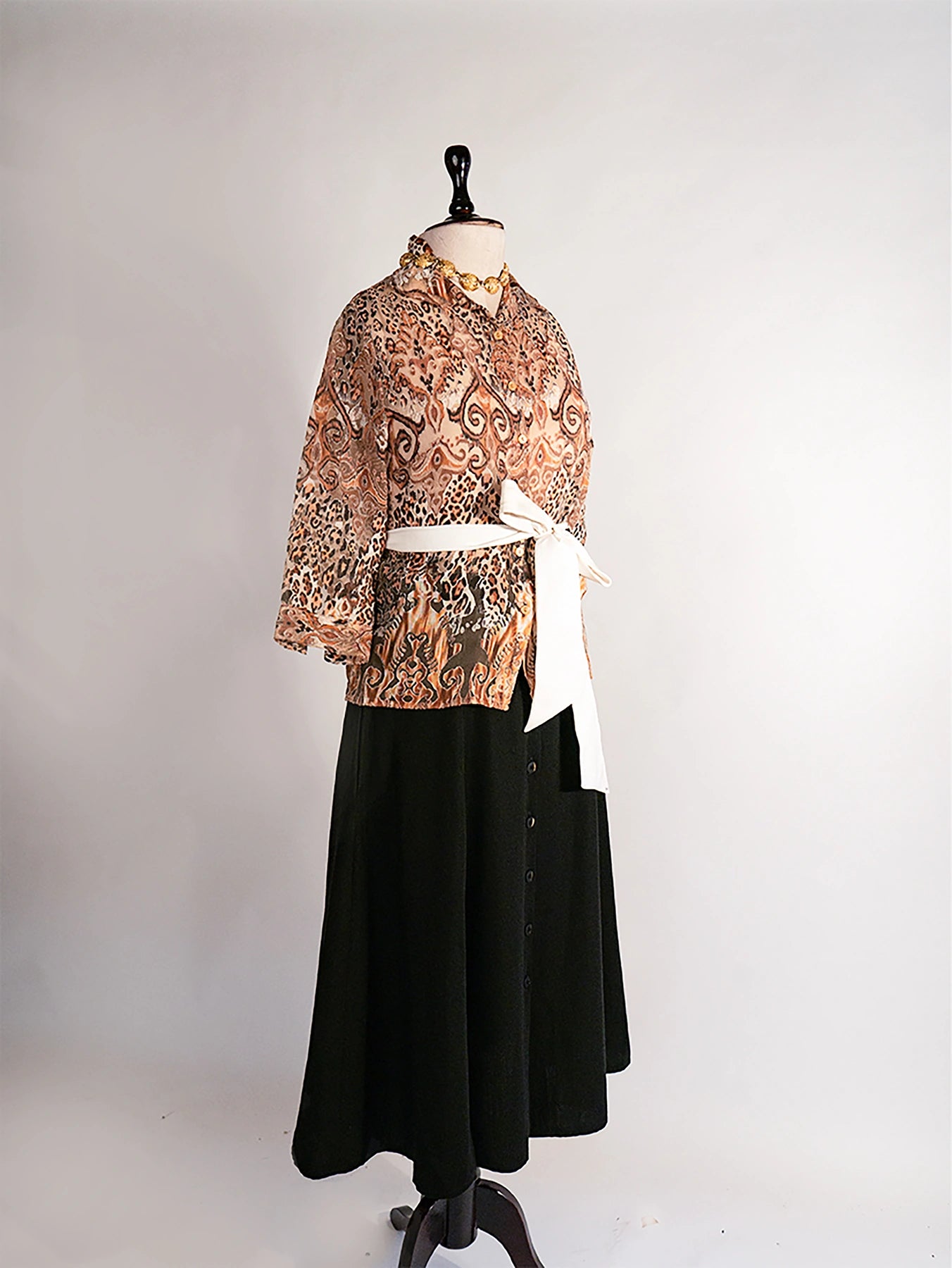 Vintage mixed animal print blouse with 3/4 sleeves.