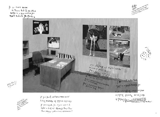 A black and white photo of an office glued to the paper with writing all around.