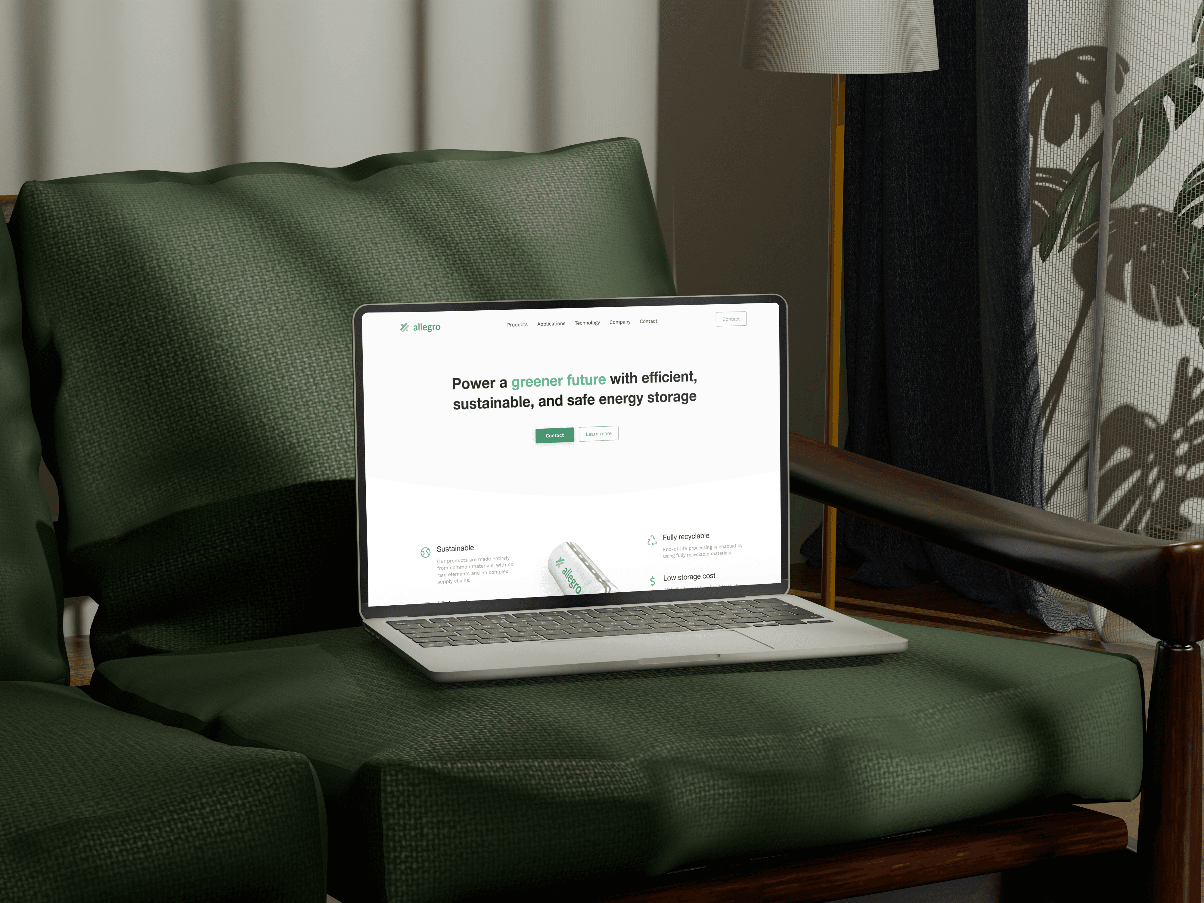 An open laptop sitting on a green chair, showing the Allegro Energy website