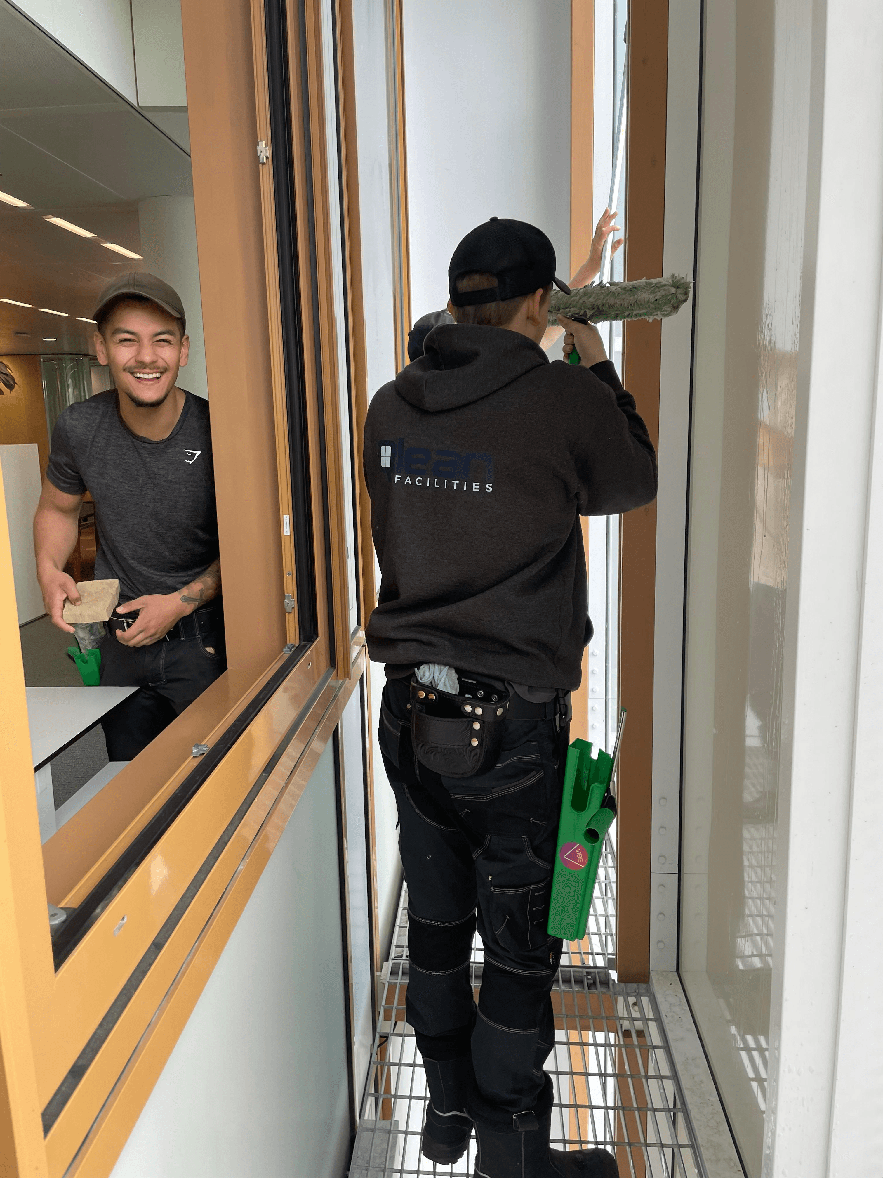 woman in gray hijab and gray coat
