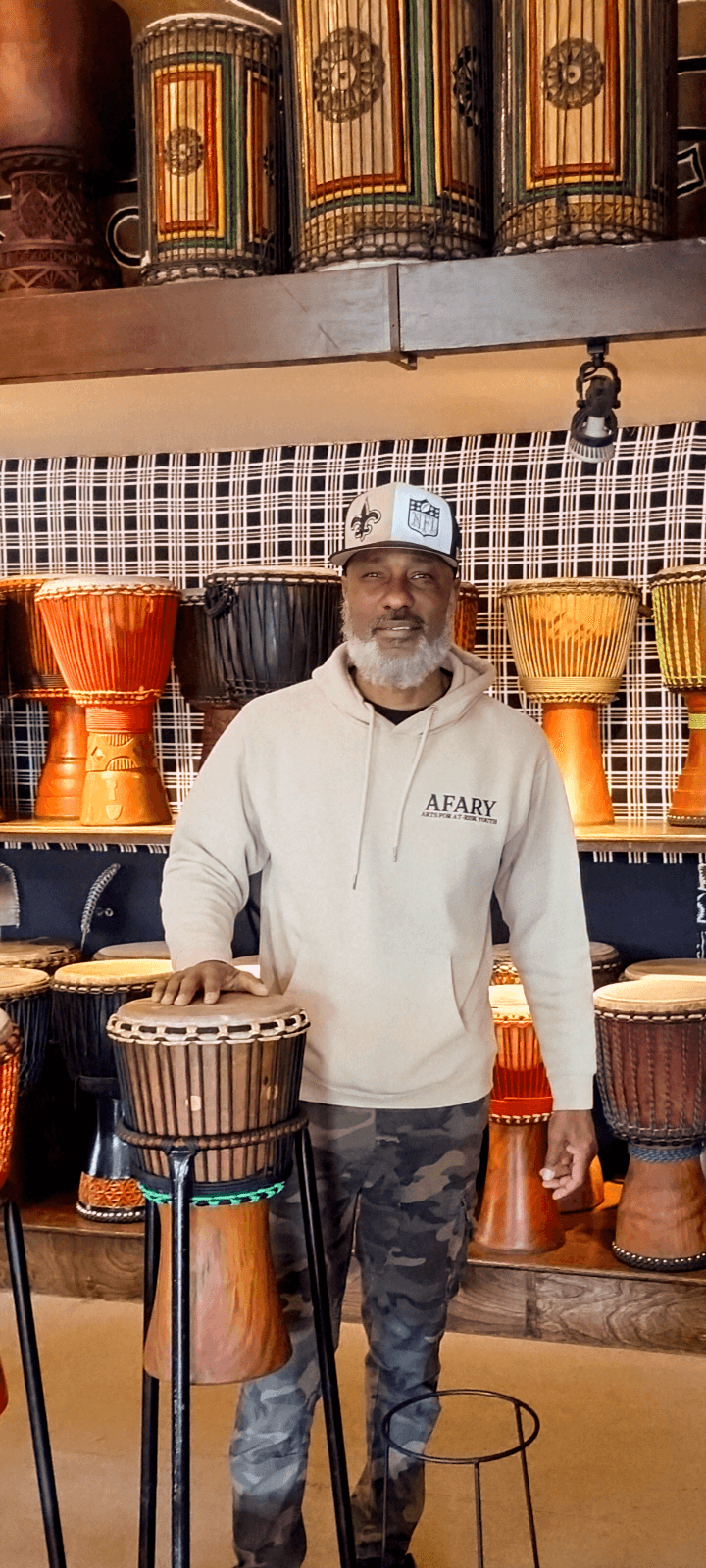 A welcome packet with retreat materials, journal, and tea on a wooden table, soft sunlight, intentional and inviting atmosphere, flat lay style.