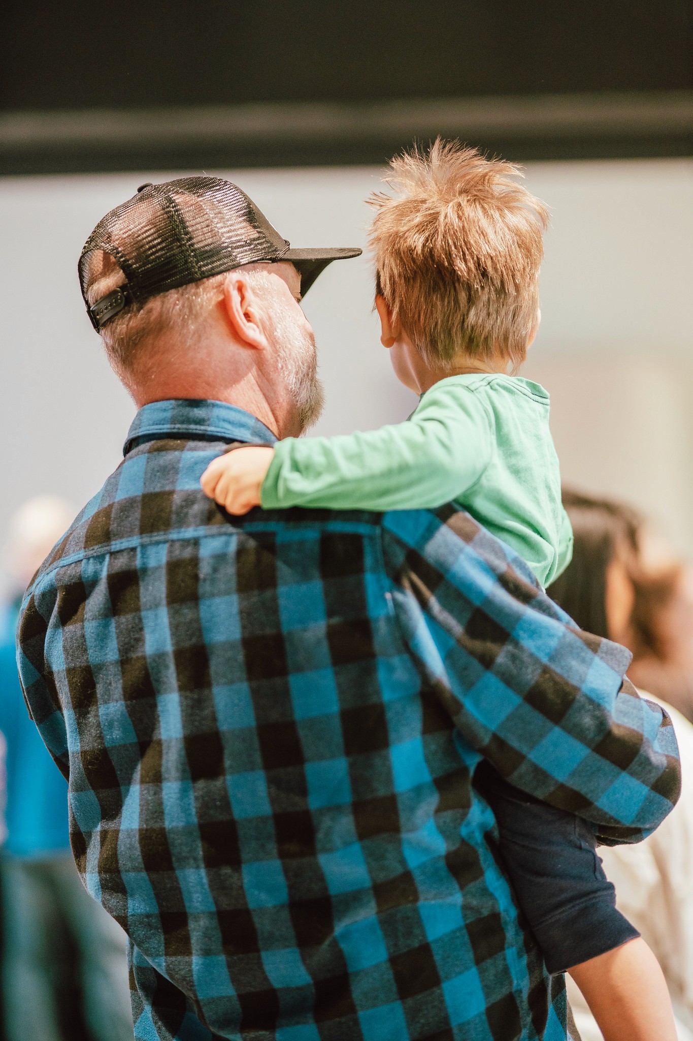 A Boy and His Grandpa in a team meeting