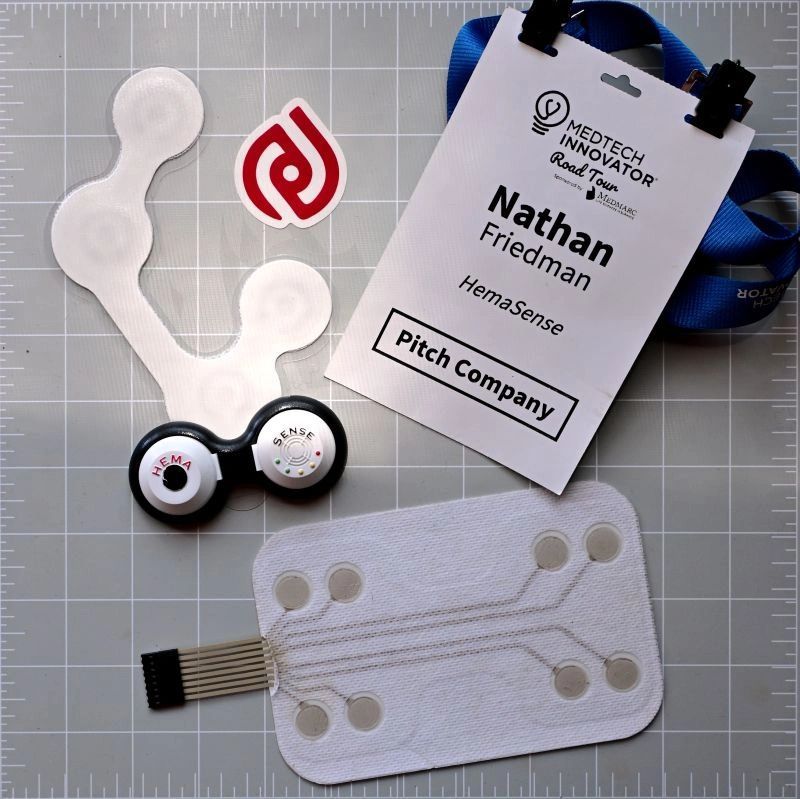 a black and white living room with a large tv