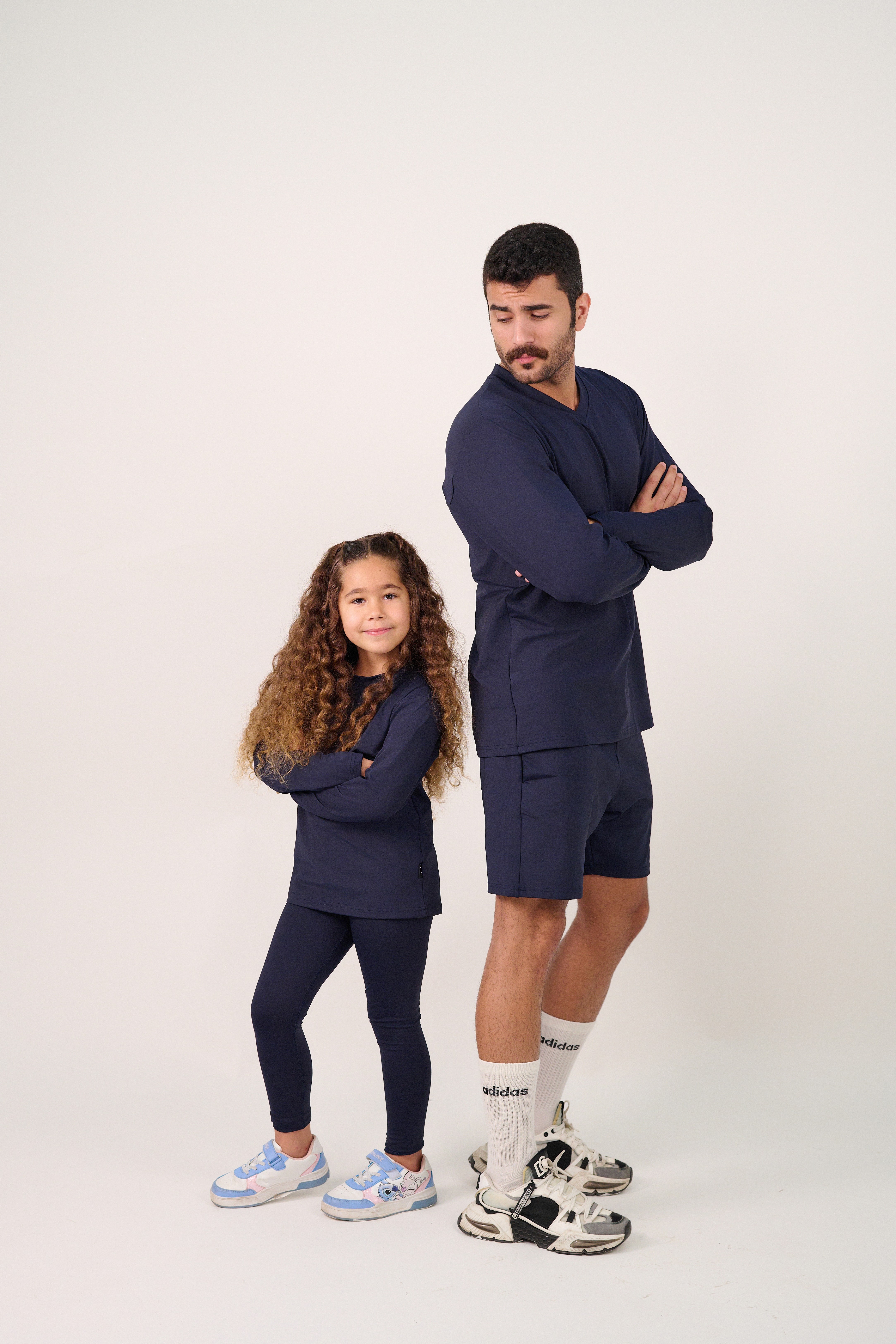 Friends laughing and posing inside a car