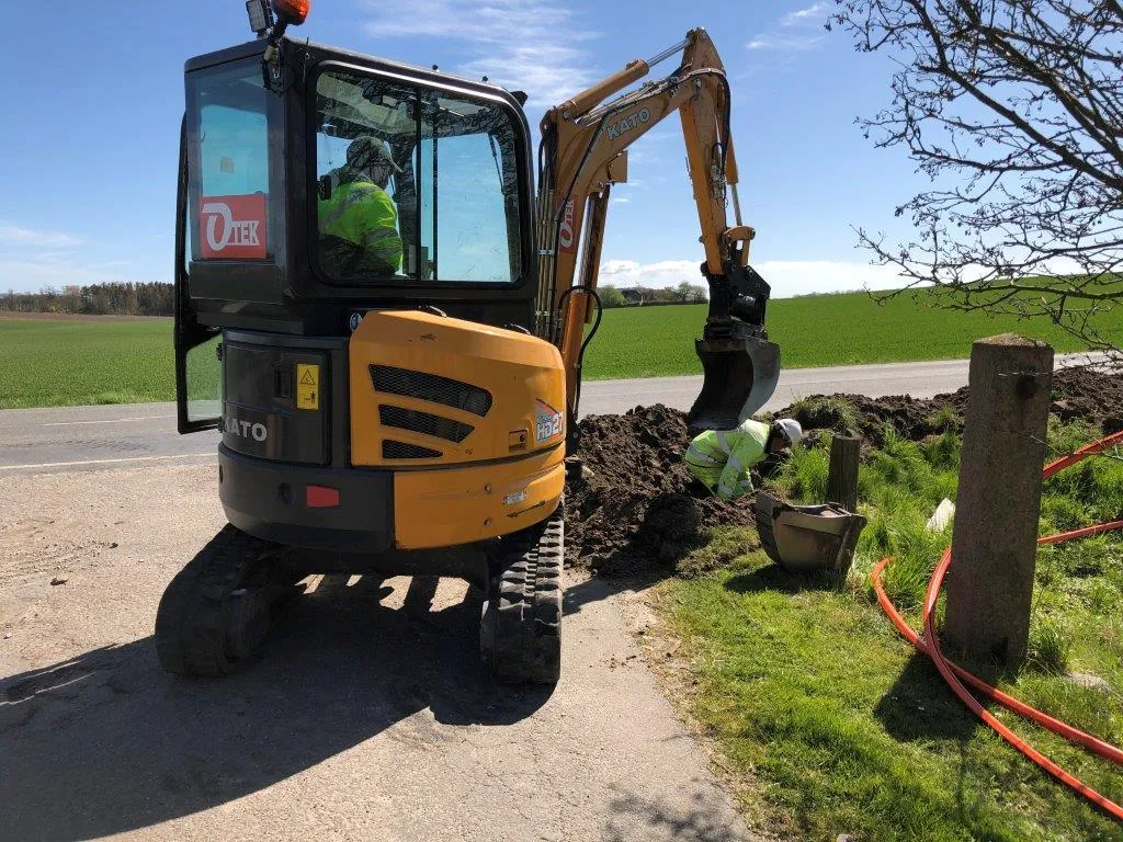 graver i grønt område