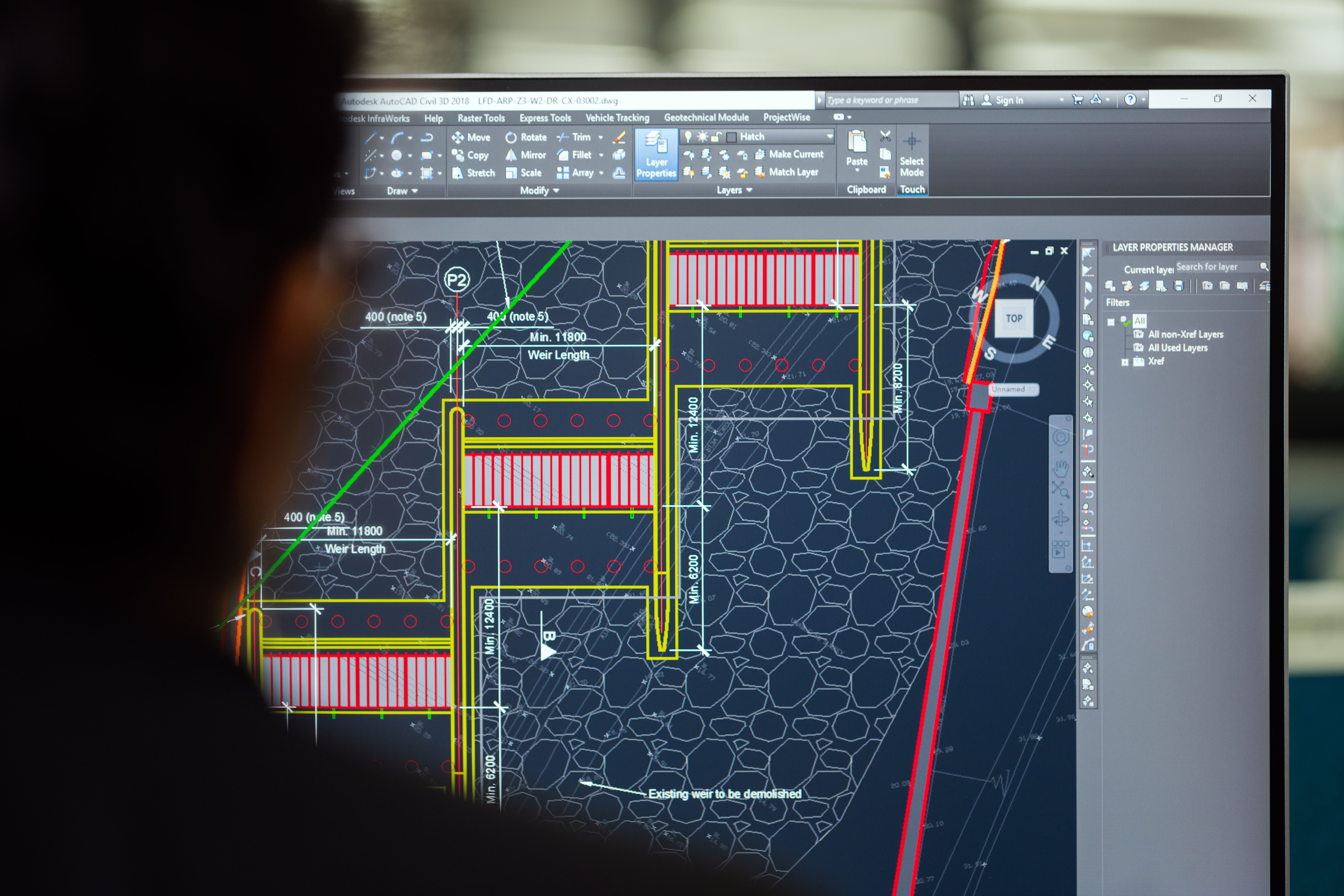 Engineering intern analyzing CAD engineering drawings to complete professional design work via ITP internship