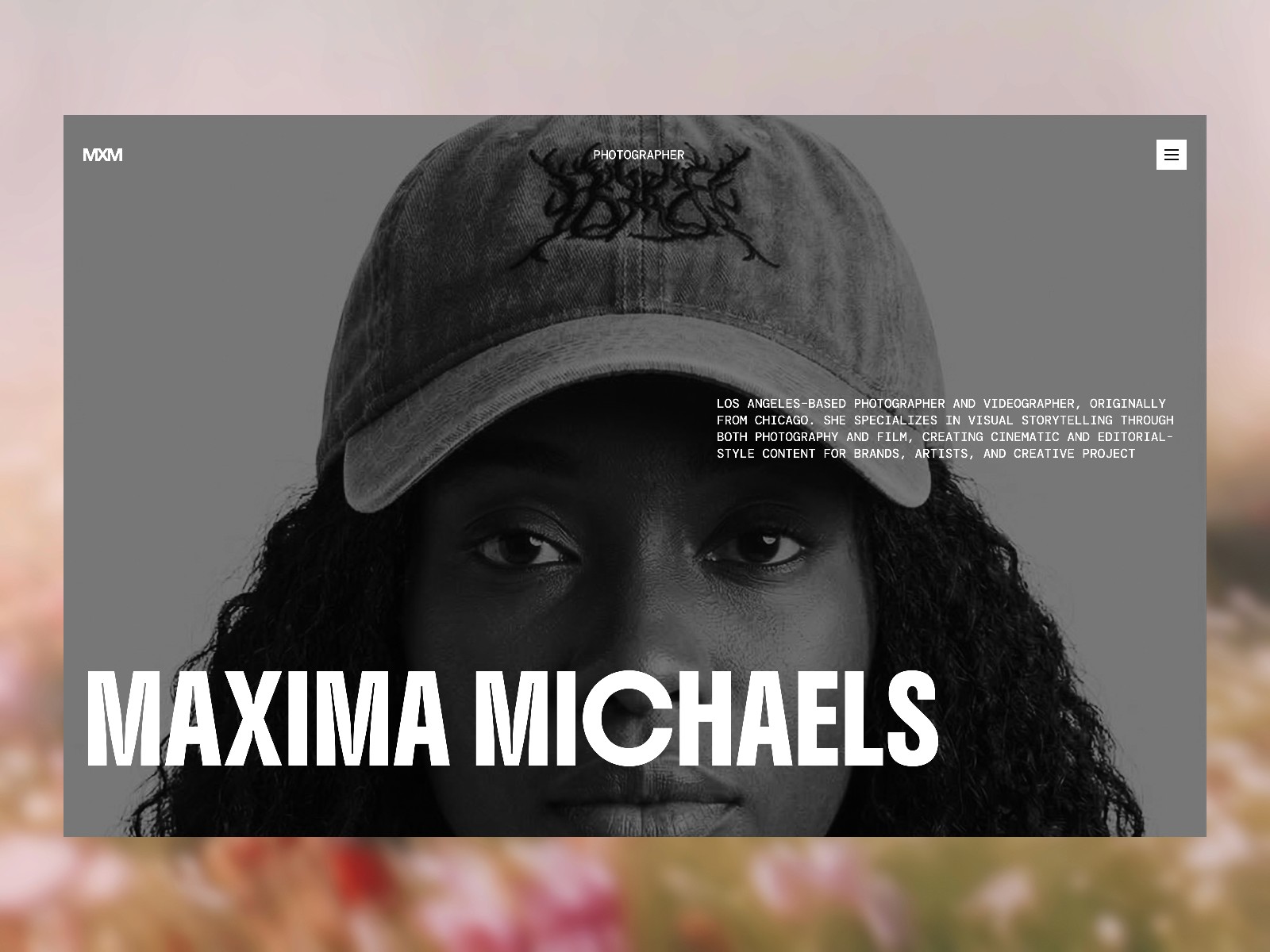 Maxima — 高级暗黑黑白极简作品集网站设计灵感