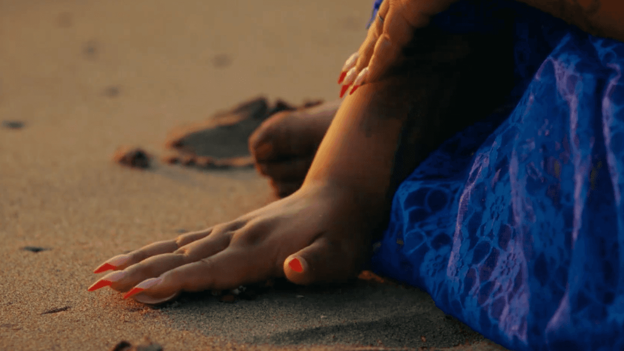 hand on sand