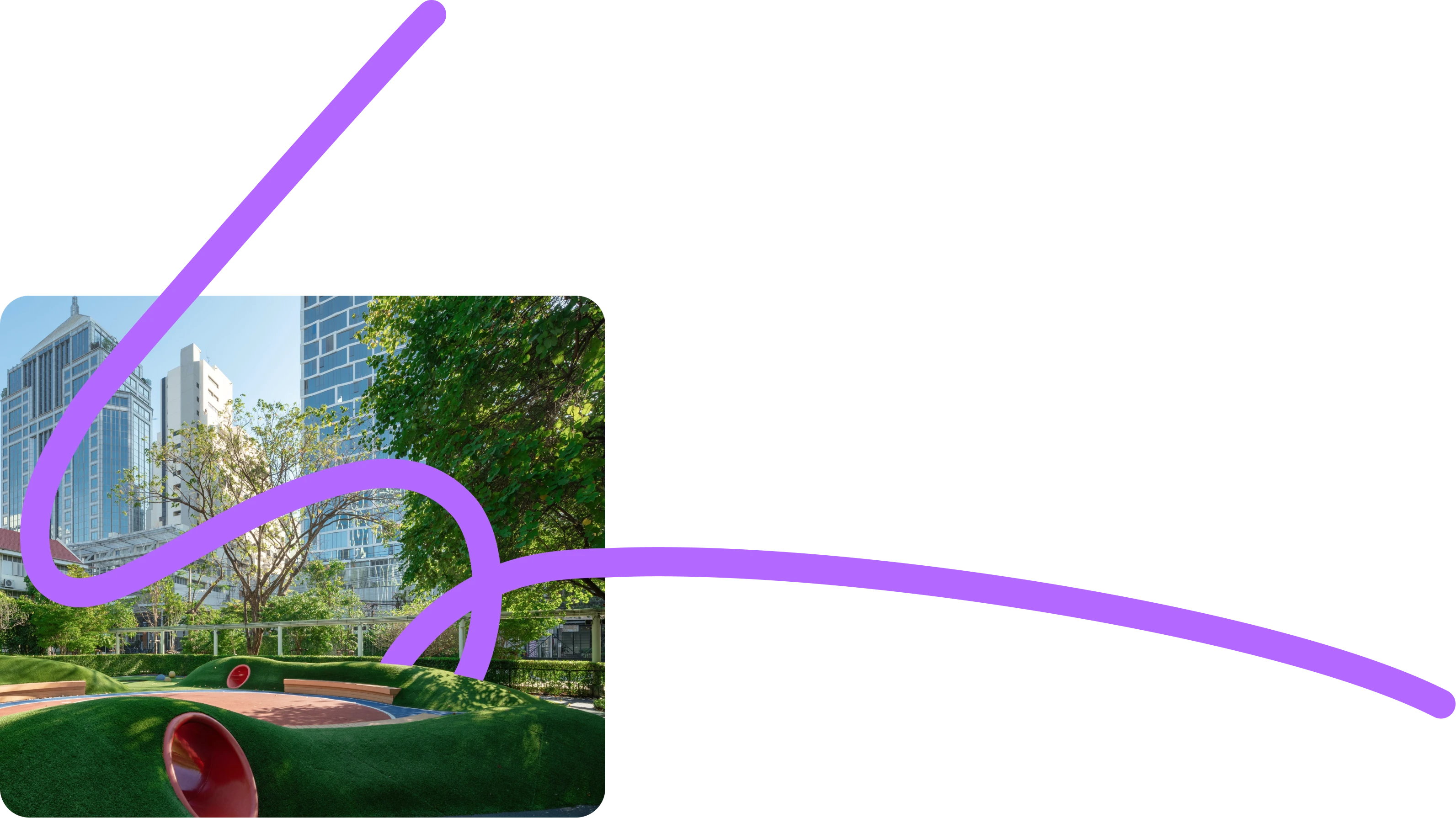 Colorful playground with green structures, a large clock, flowers, and city skyline in the background.