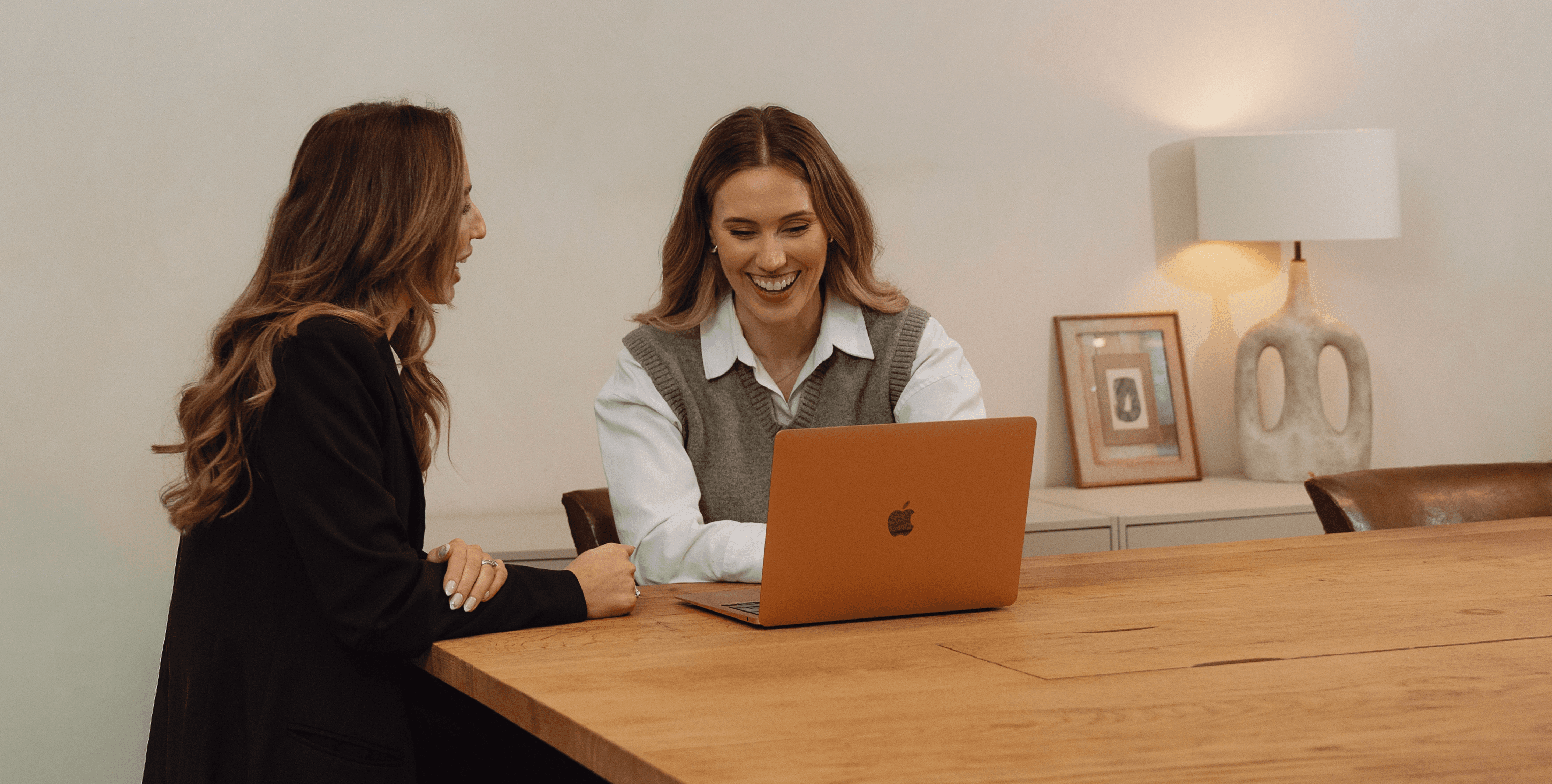 Woman holding a laptop