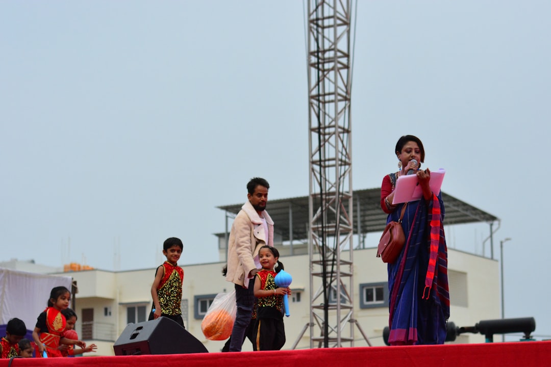 A group of people standing on top of a stage