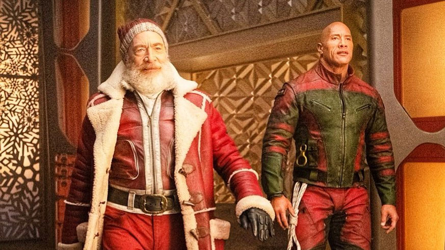 A still of JK Simmons and Dwayne Johnson from the film Red One. 