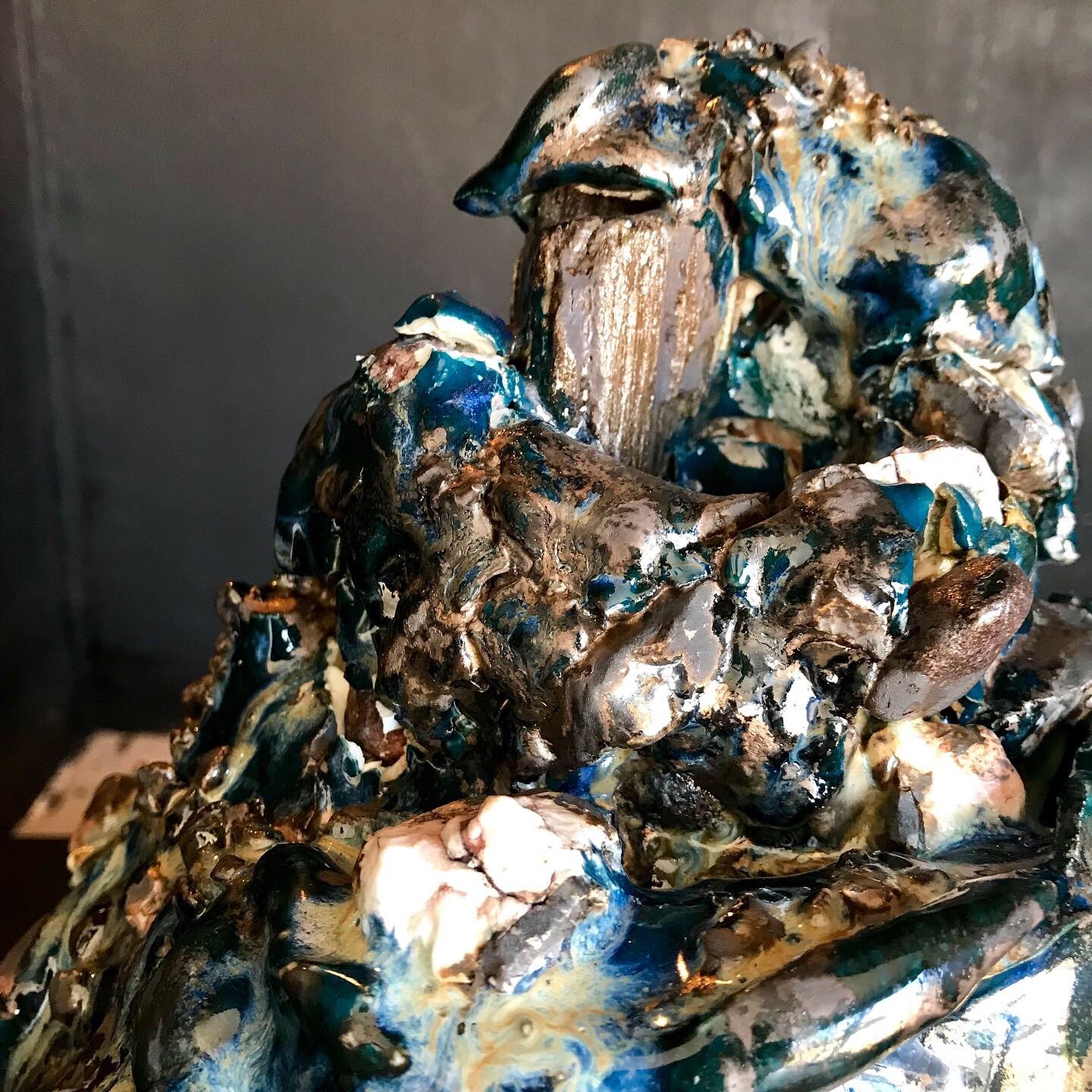 Man meditating in seated yoga pose with eyes closed