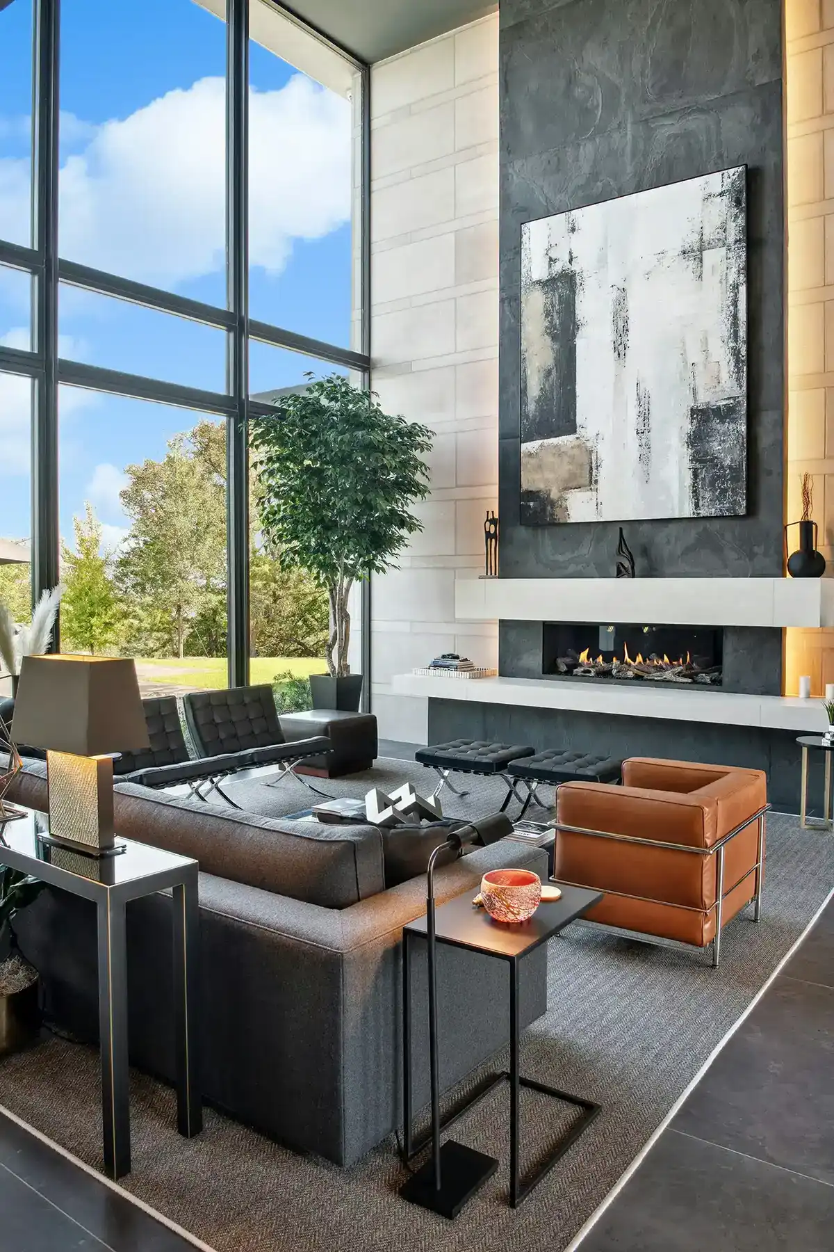 Modern living area with large windows and minimalist furniture