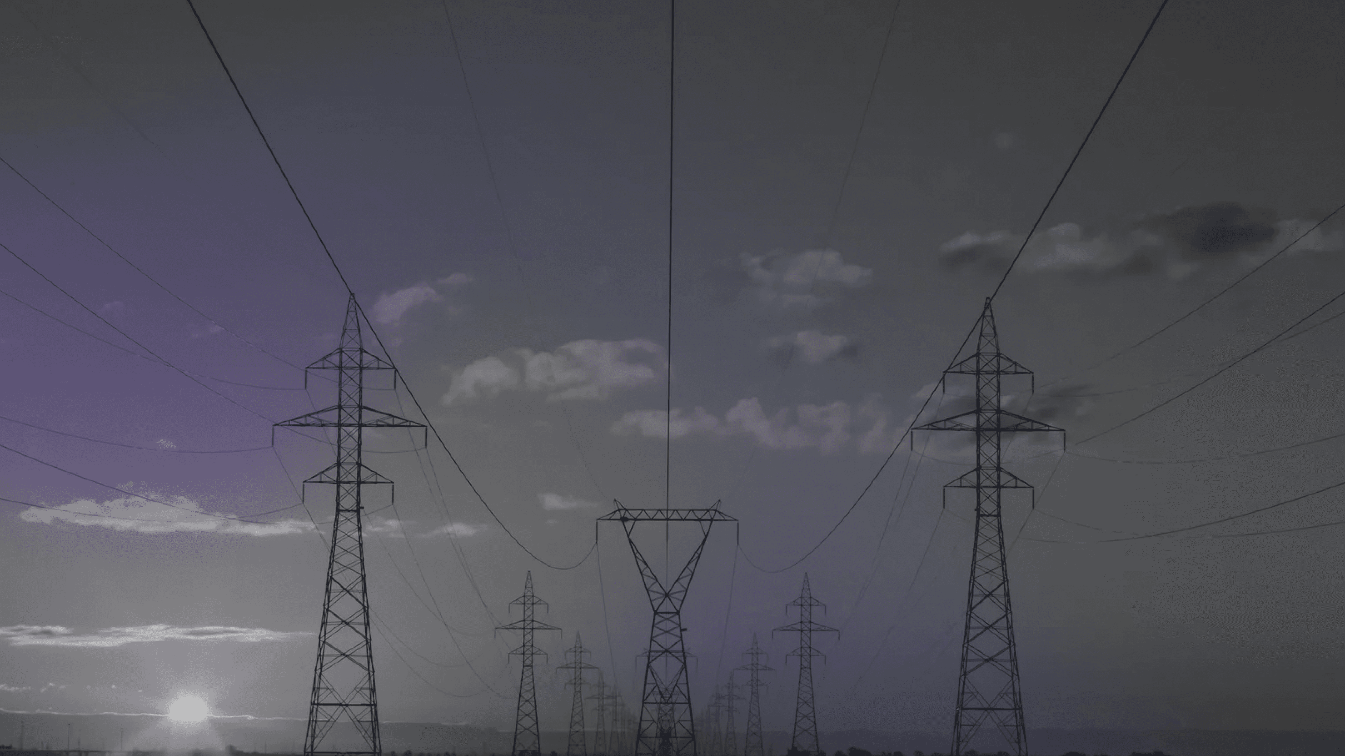 Cell phone towers at dusk.