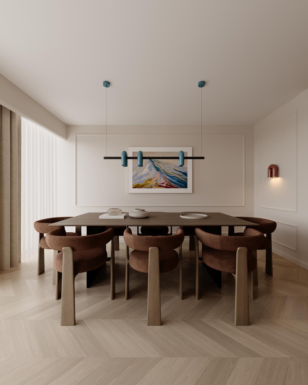 A spacious dining area with a large wooden table surrounded by chairs, minimalistic decor, and soft lighting.