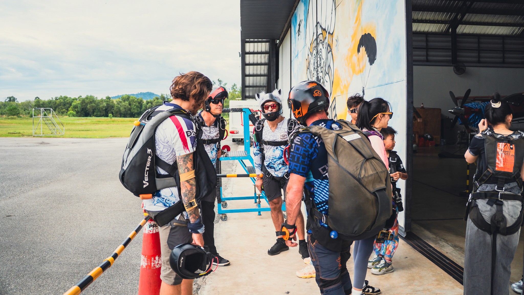 Dropzone with aircraft and skydivers