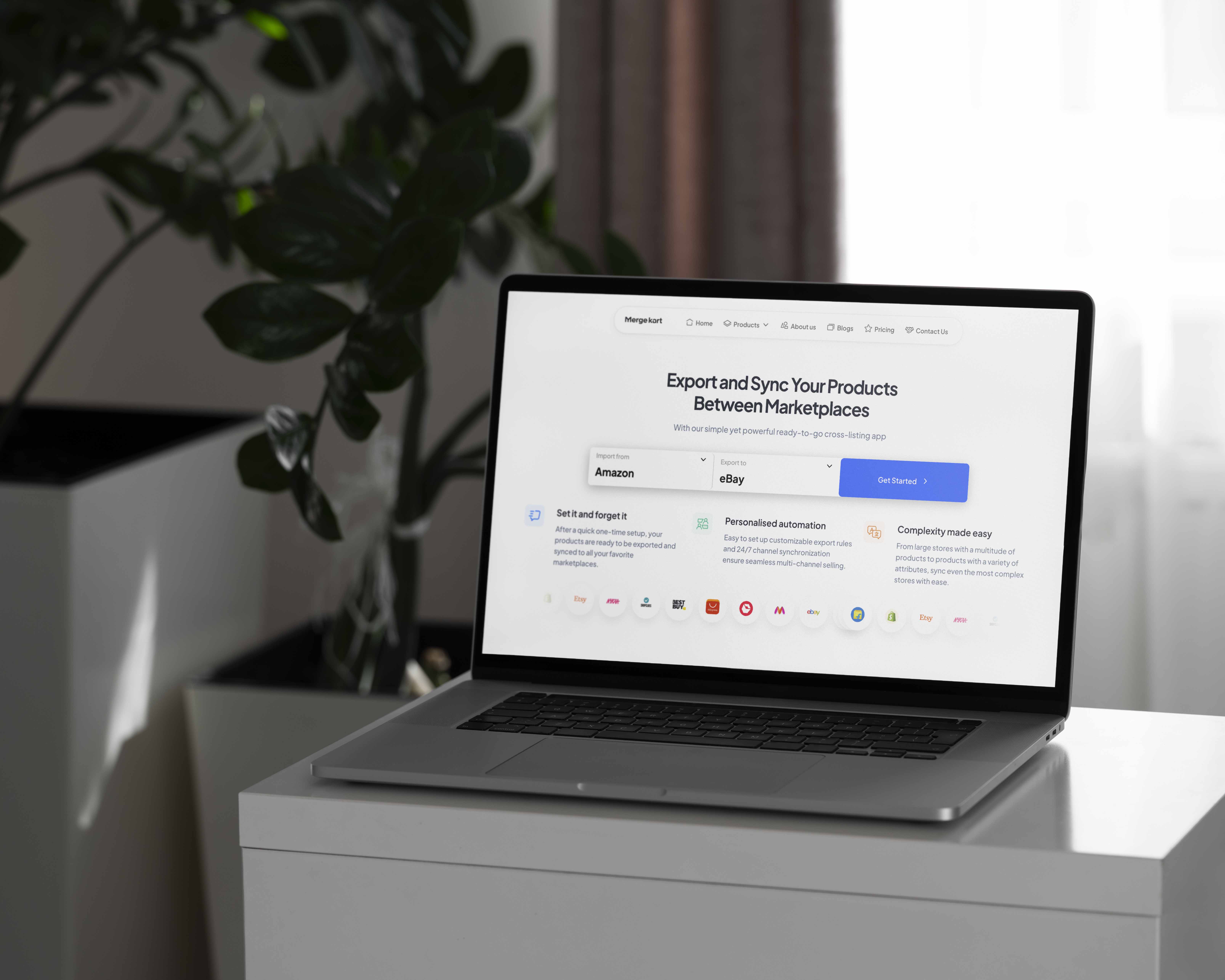 A mockup for a Macbook place on a table for a data crawling website