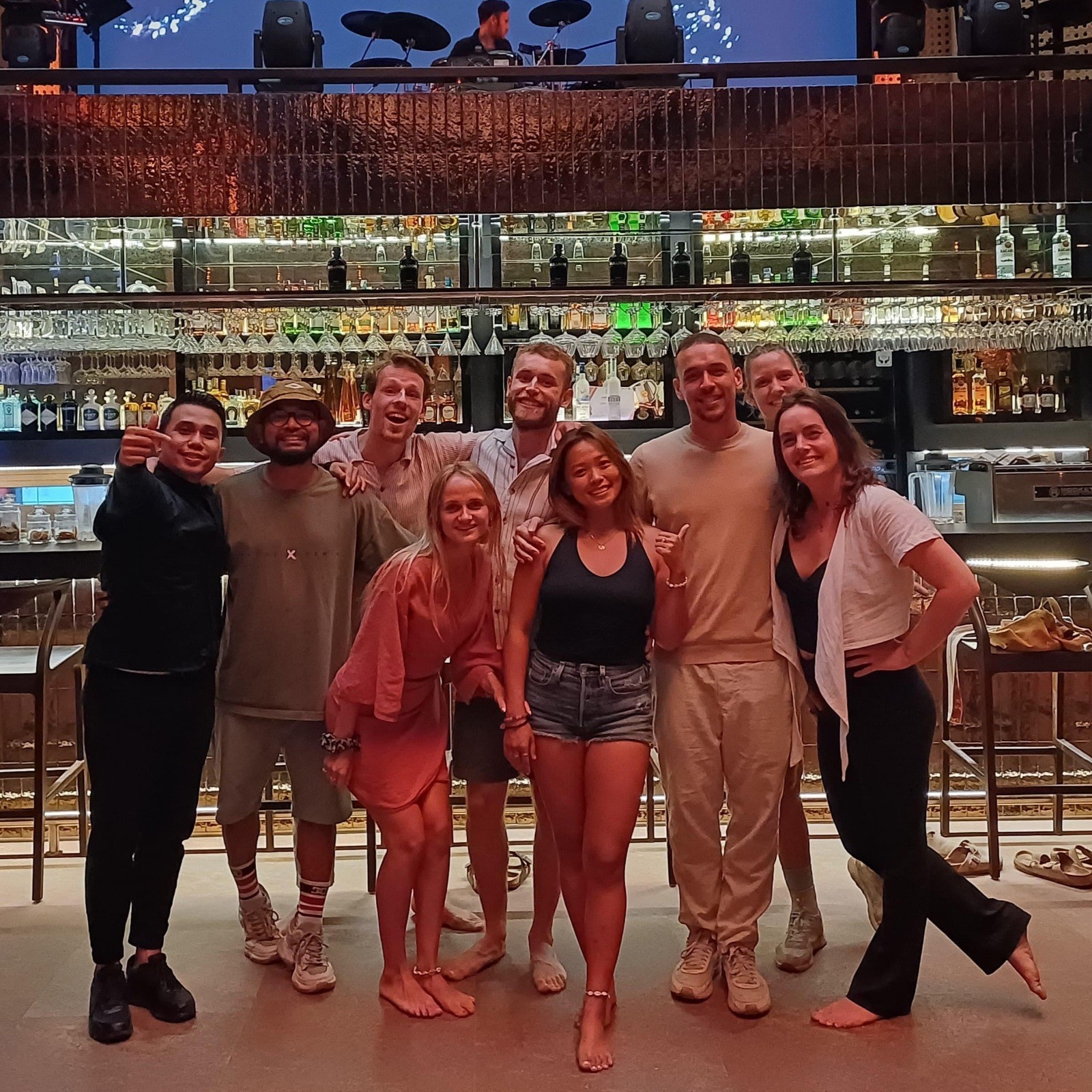 smiling man standing near building