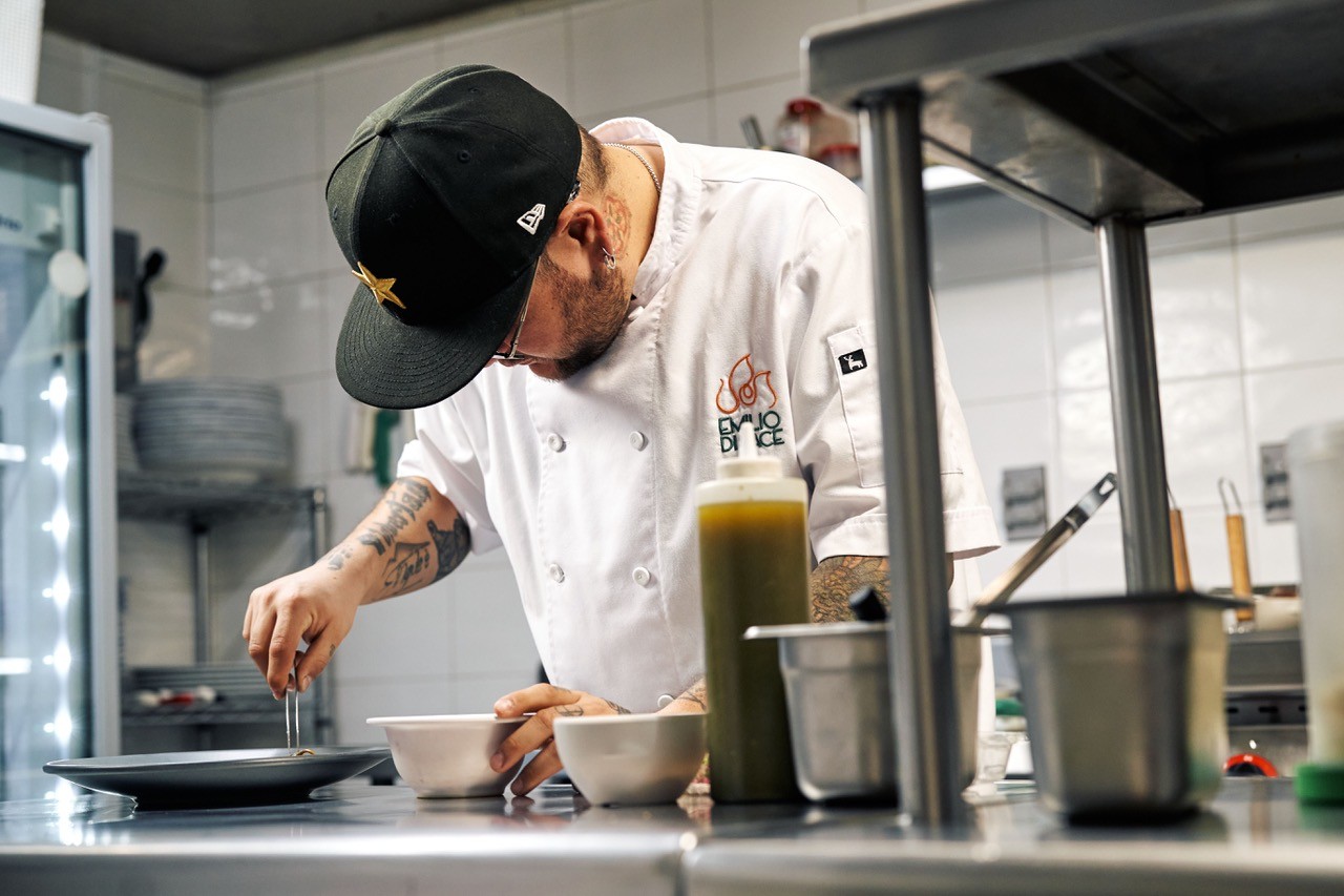 Chef in white workwear in a professional kitchen