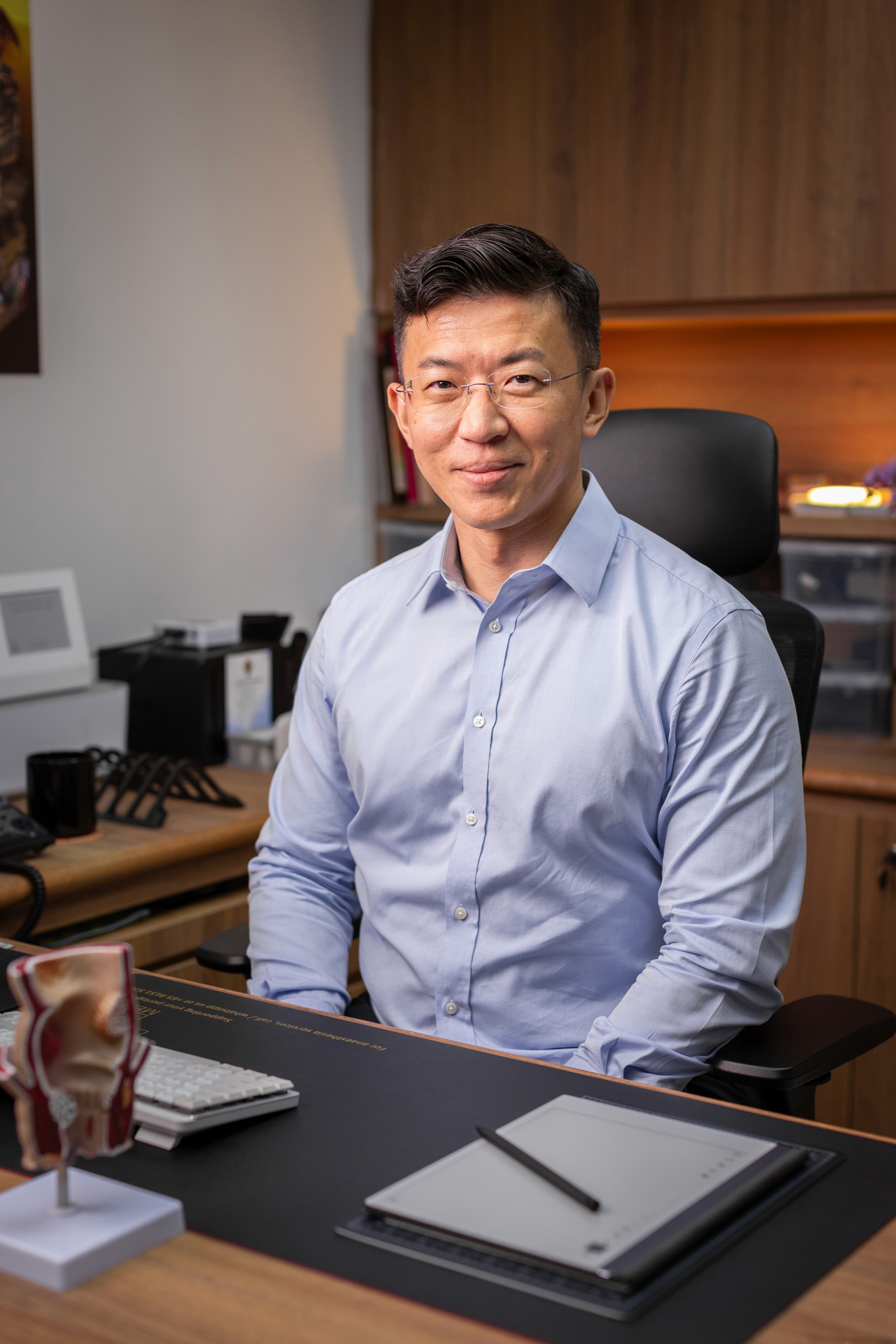 Dr Loong in the clinic.